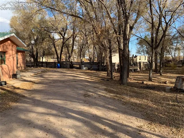 a view of road with trees