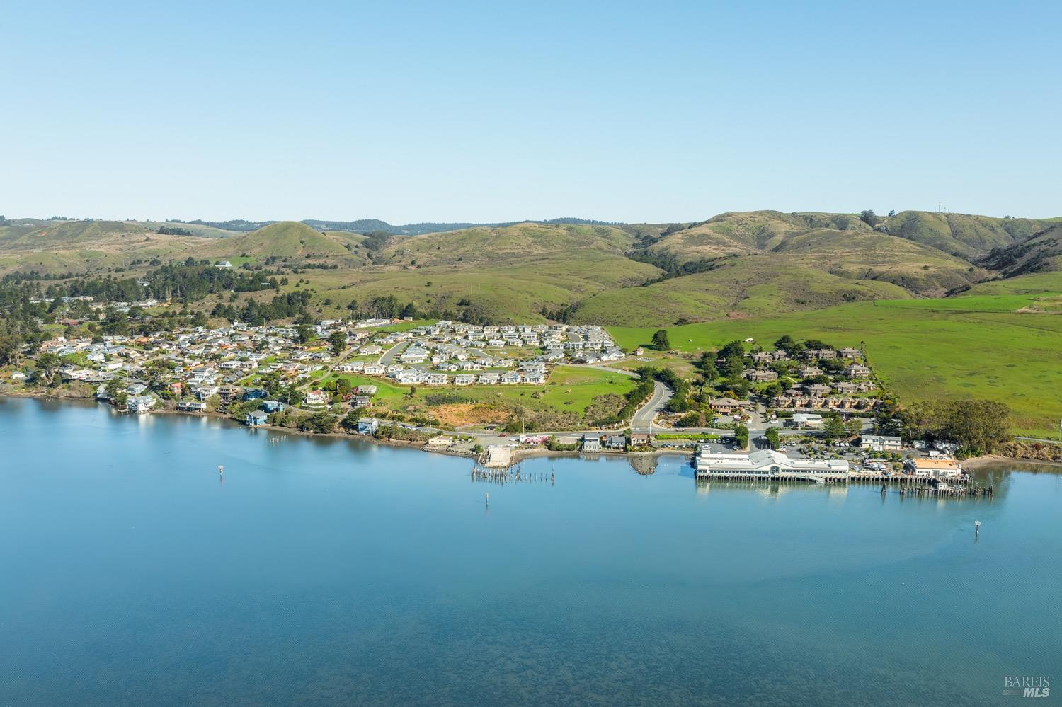 153 Harbor View Way Bodega Bay, CA 94923 - Photo 13 of 16 an aerial view of ocean and residential houses with outdoor space