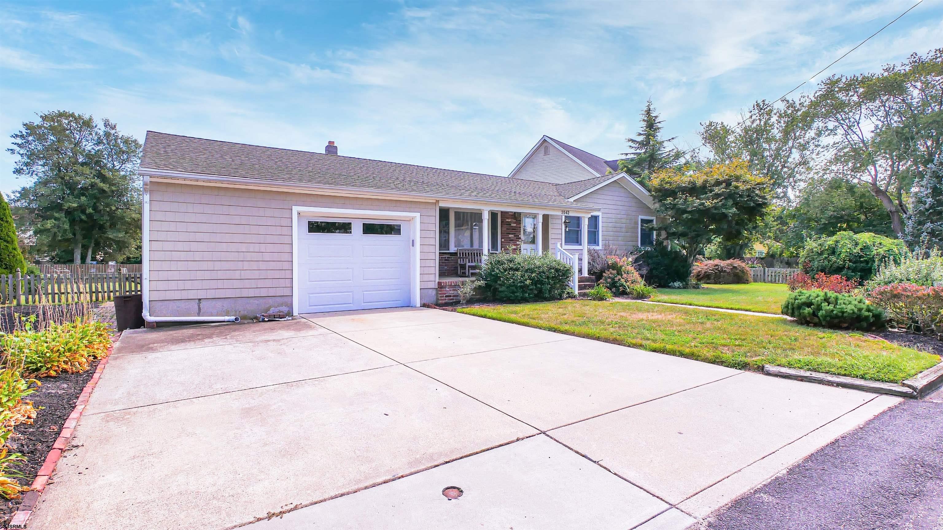 2042 Sutton Avenue Northfield, NJ 08225 - Photo 2 of 32 a house with yard and a outdoor space