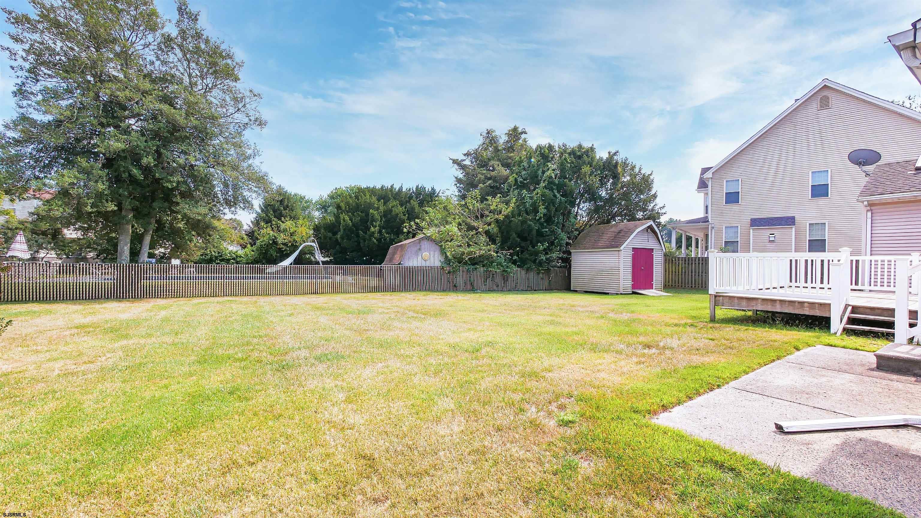 2042 Sutton Avenue Northfield, NJ 08225 - Photo 30 of 32 a view of swimming pool with lawn chairs and plants