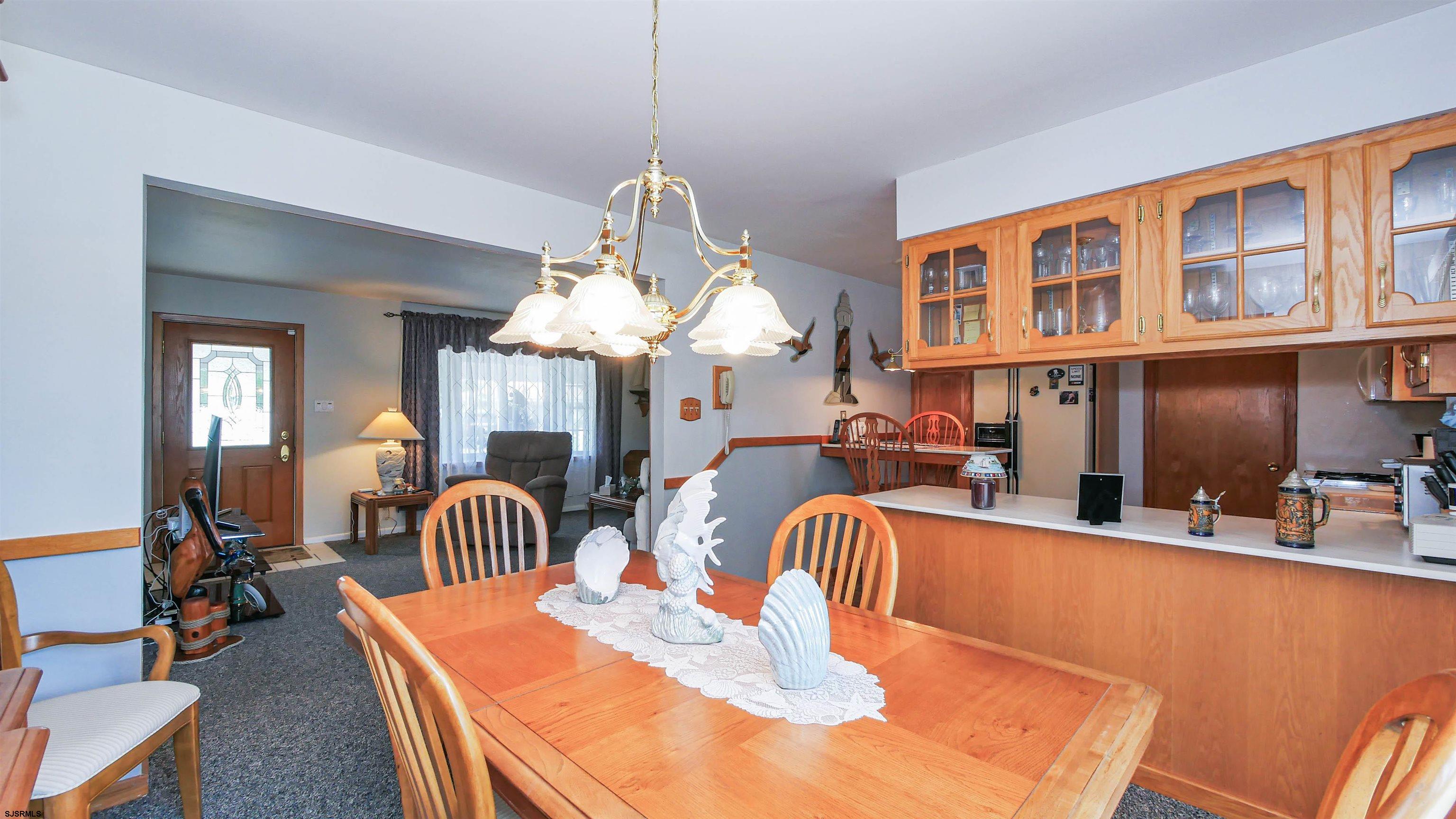 2042 Sutton Avenue Northfield, NJ 08225 - Photo 10 of 32 a dining room filled with furniture