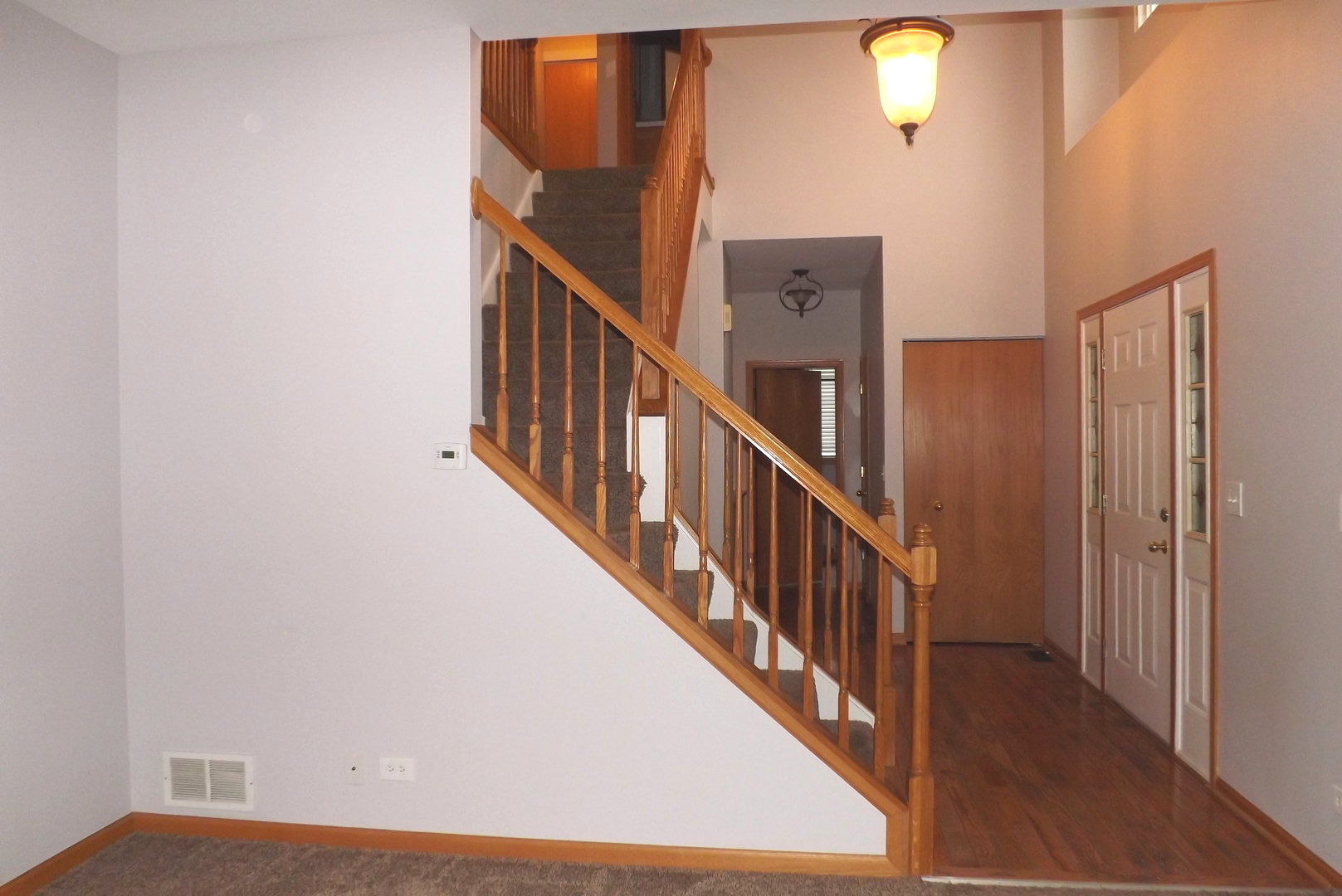 512 West Wildspring Road Round Lake, IL 60073 - Photo 3 of 16 a view of a hallway with windows