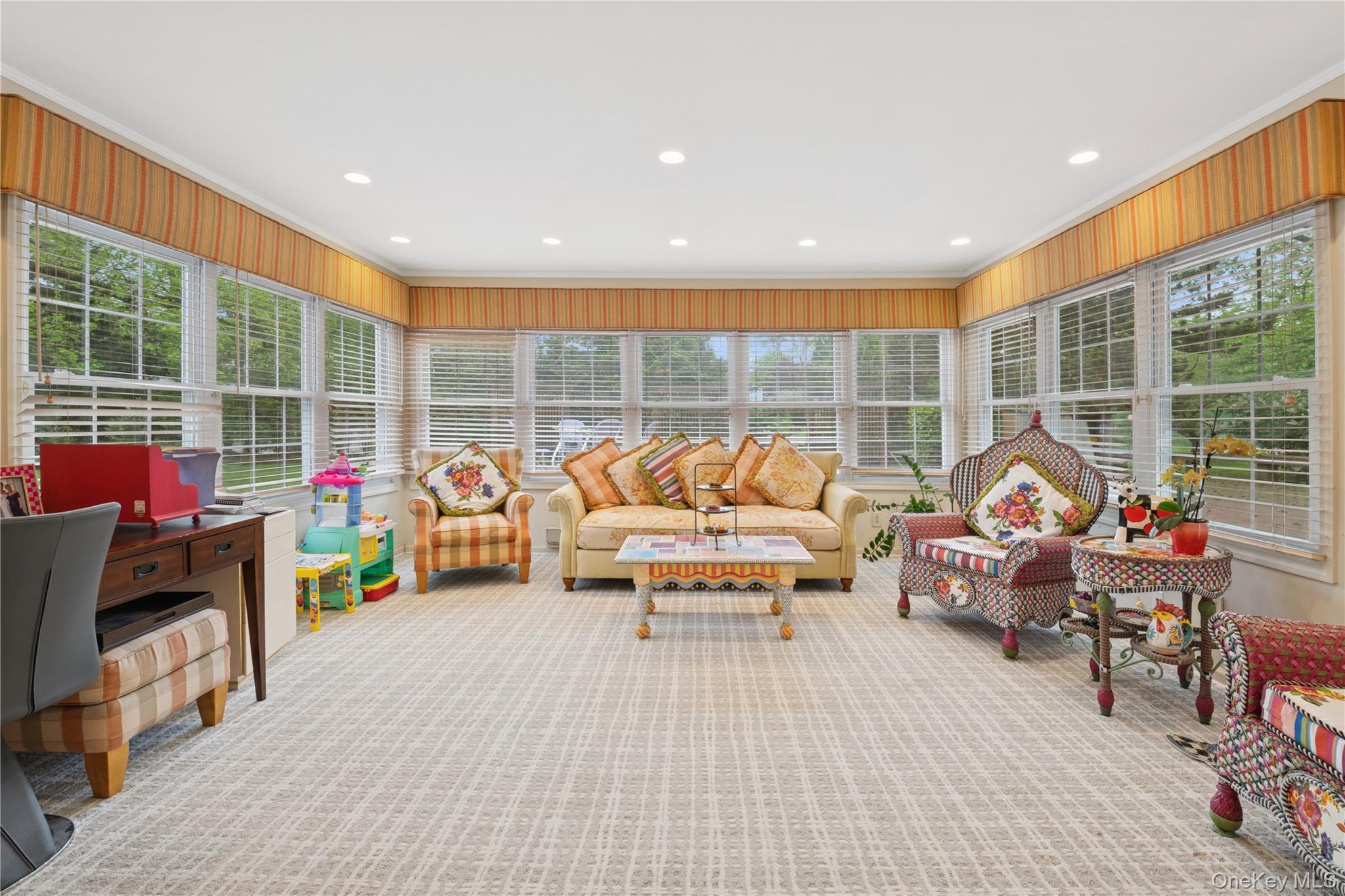 1302 Azure Place Hewlett, NY 11557 - Photo 11 of 32 a living room filled with furniture and a flat screen tv