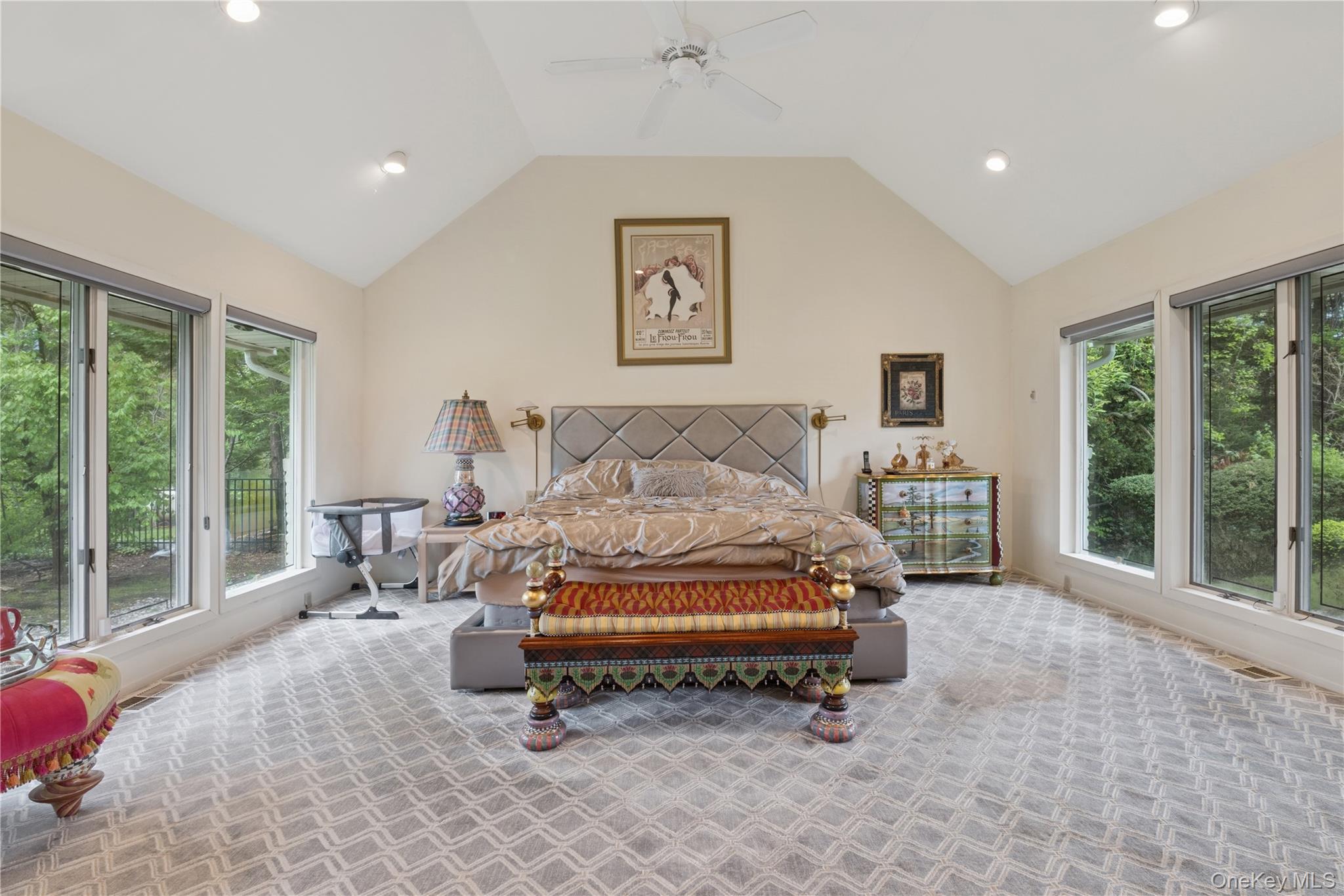 1302 Azure Place Hewlett, NY 11557 - Photo 17 of 32 a spacious bedroom with a large bed and a large window