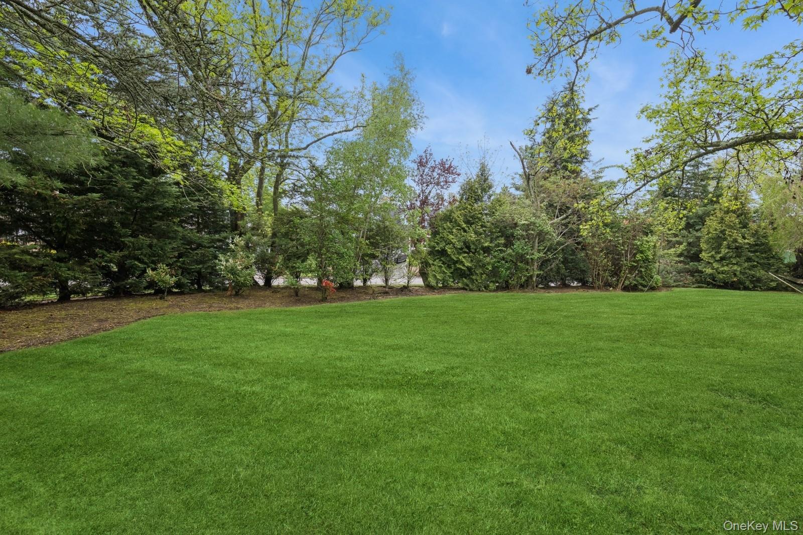 1302 Azure Place Hewlett, NY 11557 - Photo 23 of 32 a view of green field