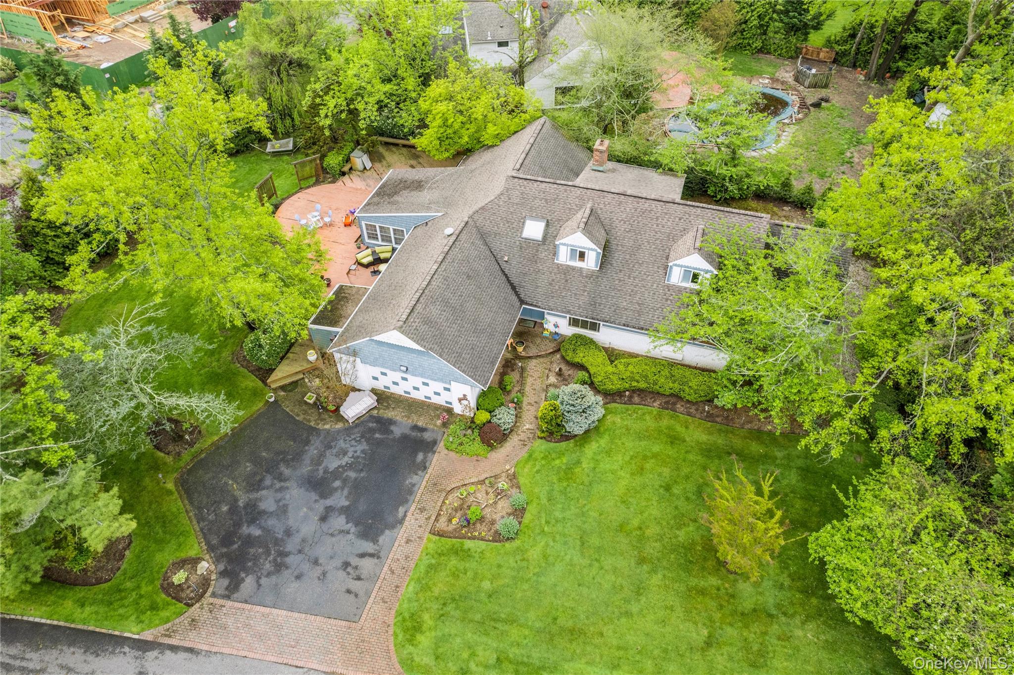 1302 Azure Place Hewlett, NY 11557 - Photo 26 of 32 an aerial view of a house with a yard