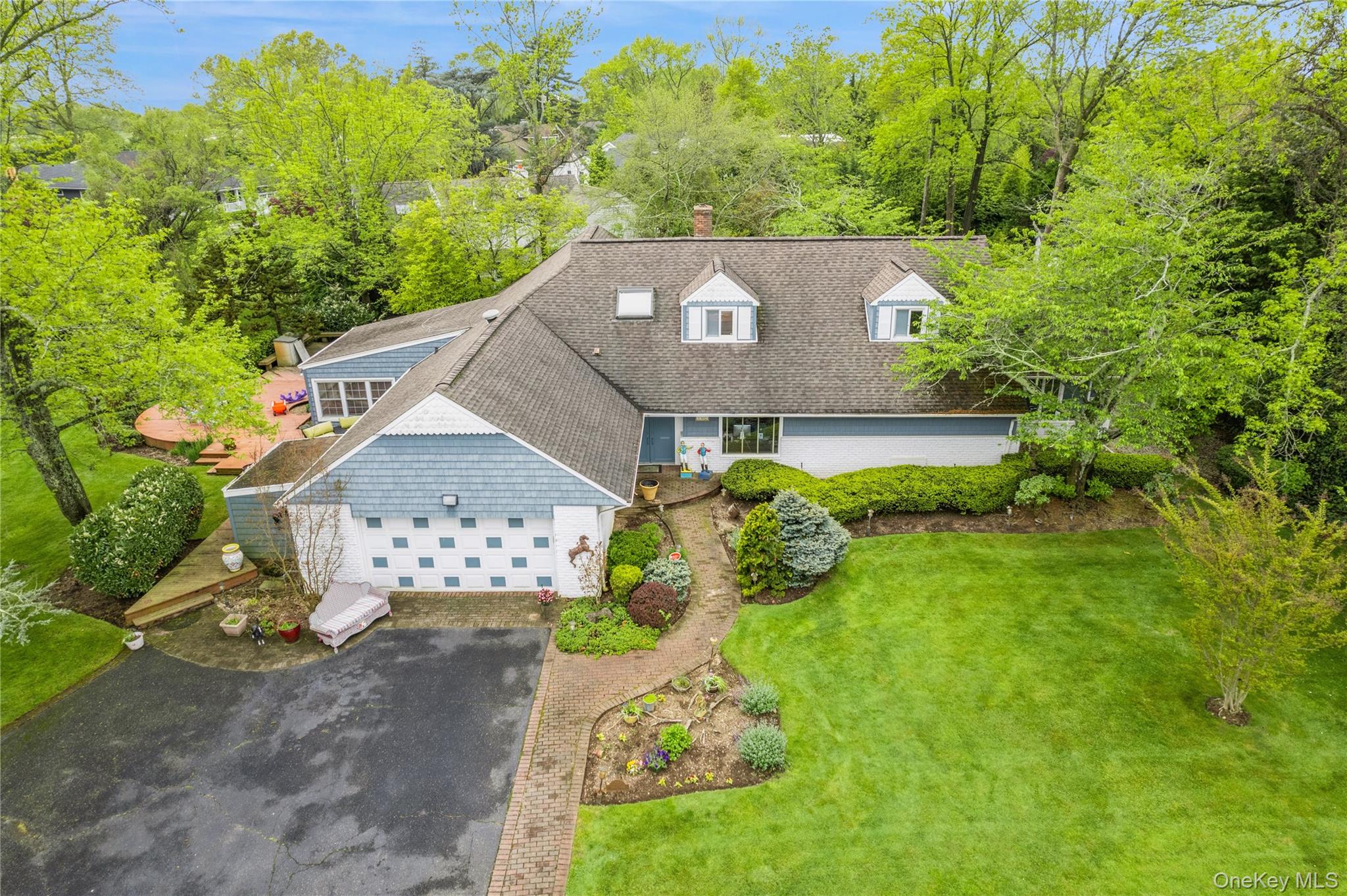 1302 Azure Place Hewlett, NY 11557 - Photo 3 of 32 an aerial view of a house