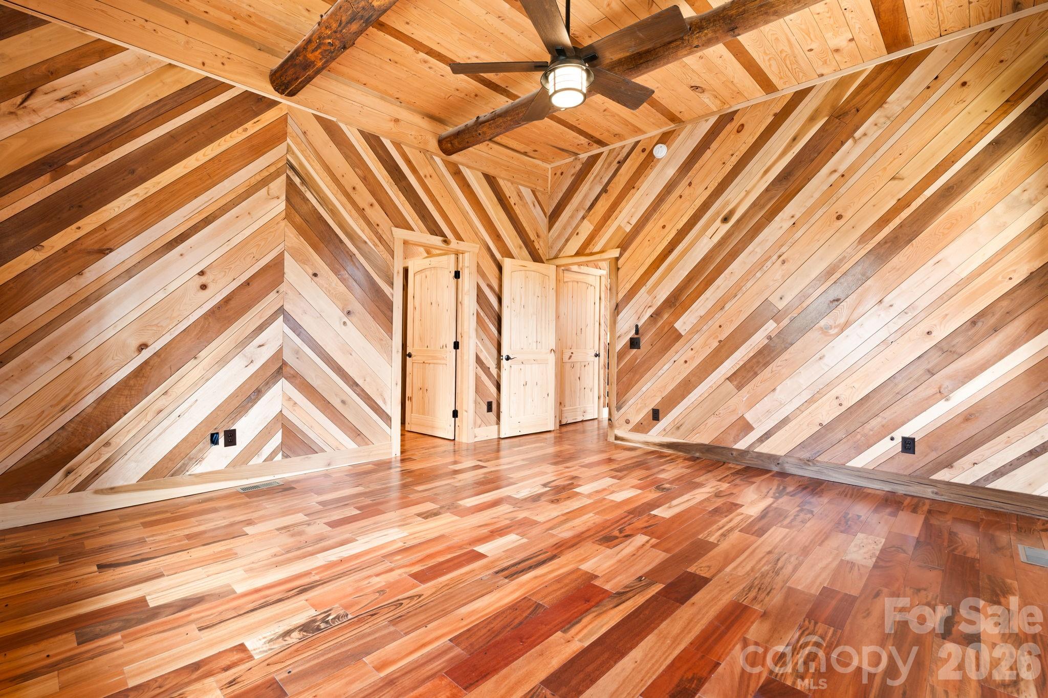 449 Hampton Ridge Road Fleetwood, NC 28626 - Photo 18 of 48 a view of room with a ceiling fan