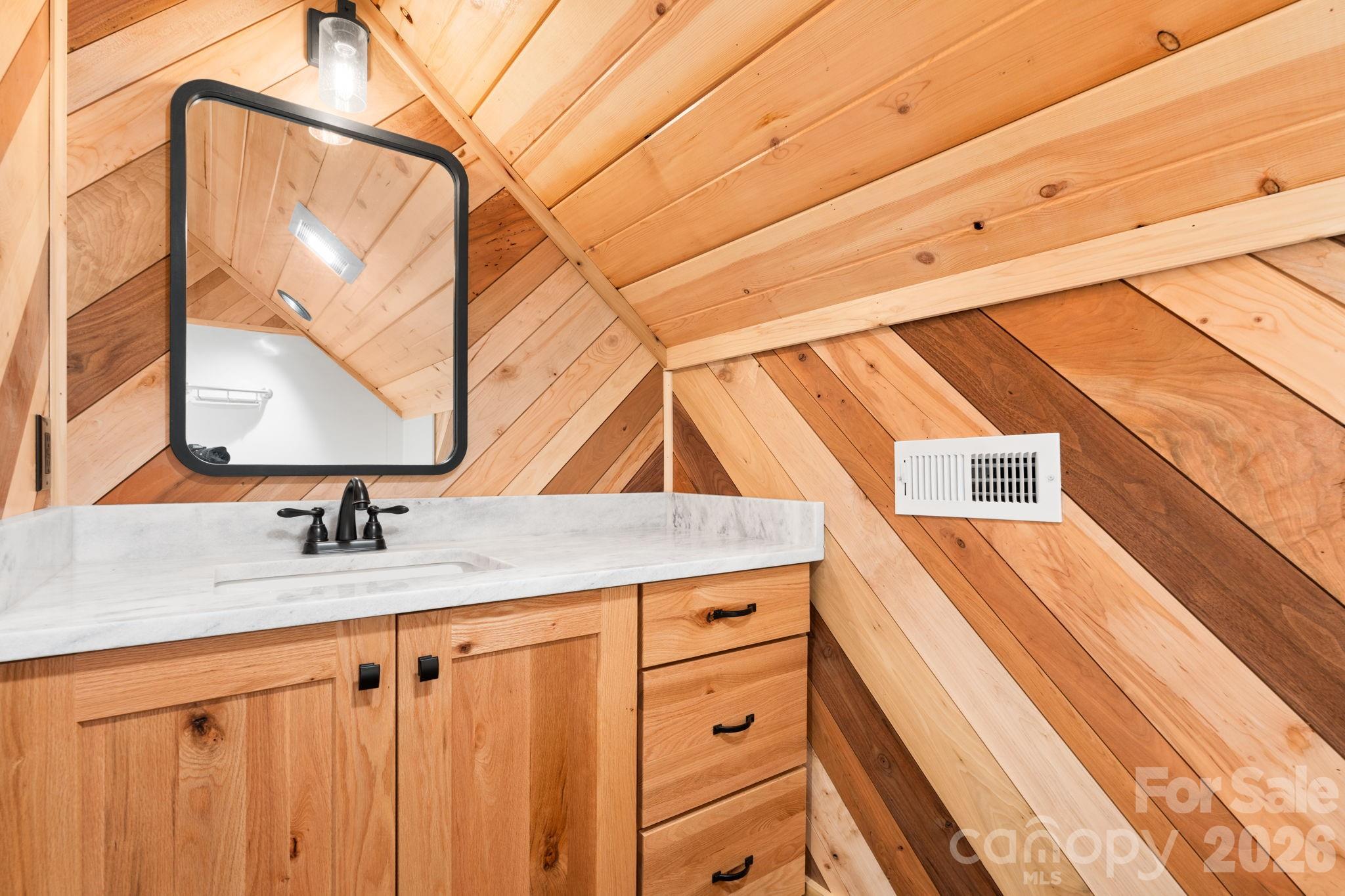449 Hampton Ridge Road Fleetwood, NC 28626 - Photo 25 of 48 a kitchen view with wooden floor and a sink