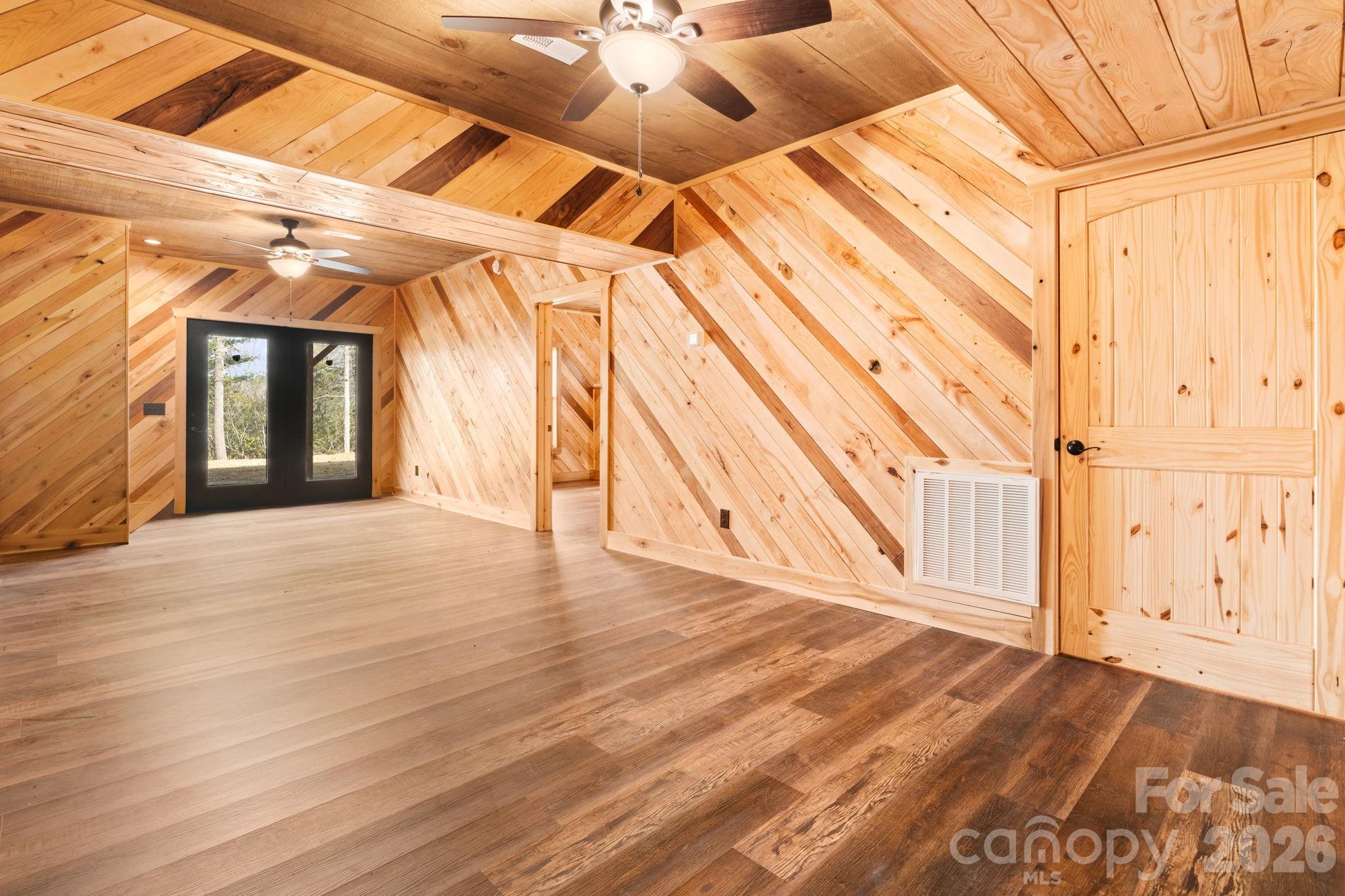 449 Hampton Ridge Road Fleetwood, NC 28626 - Photo 31 of 48 a view of an empty room