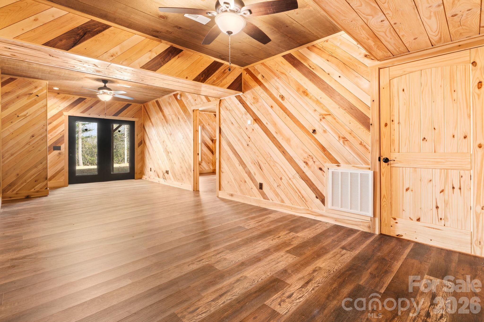 449 Hampton Ridge Road Fleetwood, NC 28626 - Photo 33 of 48 a view of an empty room