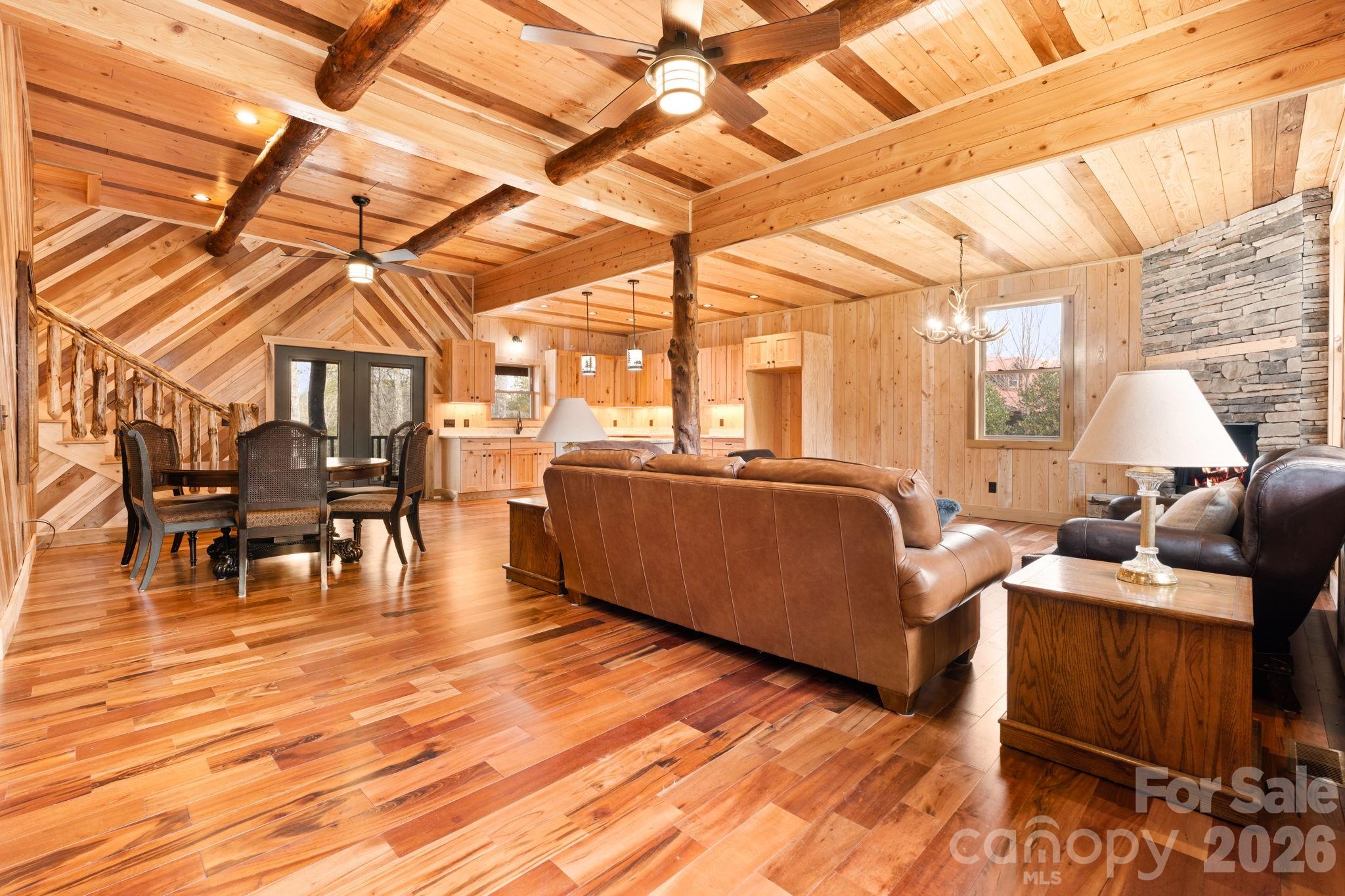 449 Hampton Ridge Road Fleetwood, NC 28626 - Photo 6 of 48 a living room with furniture and wooden floor