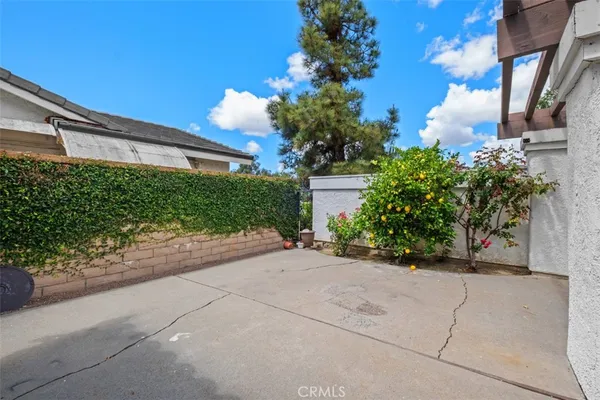 a front view of a house with a yard and a garage