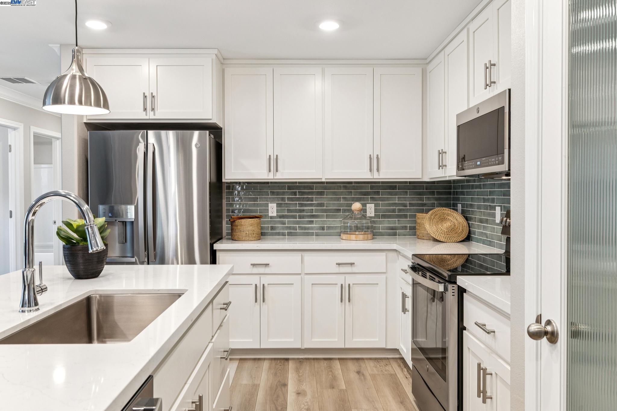 2652 Wesley Way Chico, CA 95973 - Photo 18 of 45 a kitchen with stainless steel appliances granite countertop a sink and a stove