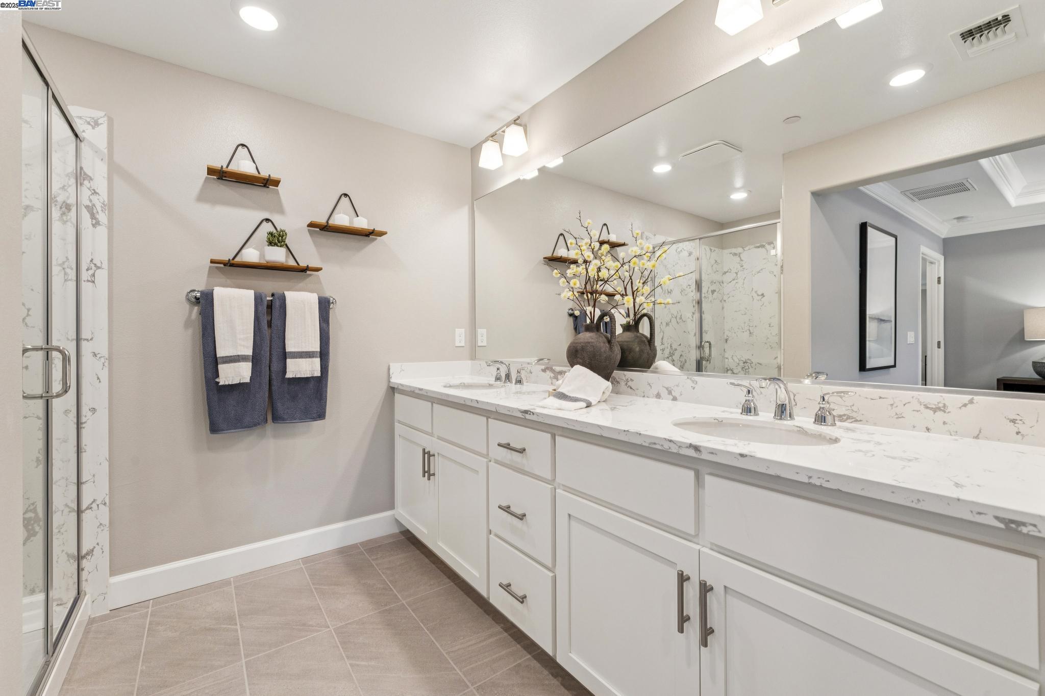 2652 Wesley Way Chico, CA 95973 - Photo 29 of 45 a bathroom with double sink and a mirror