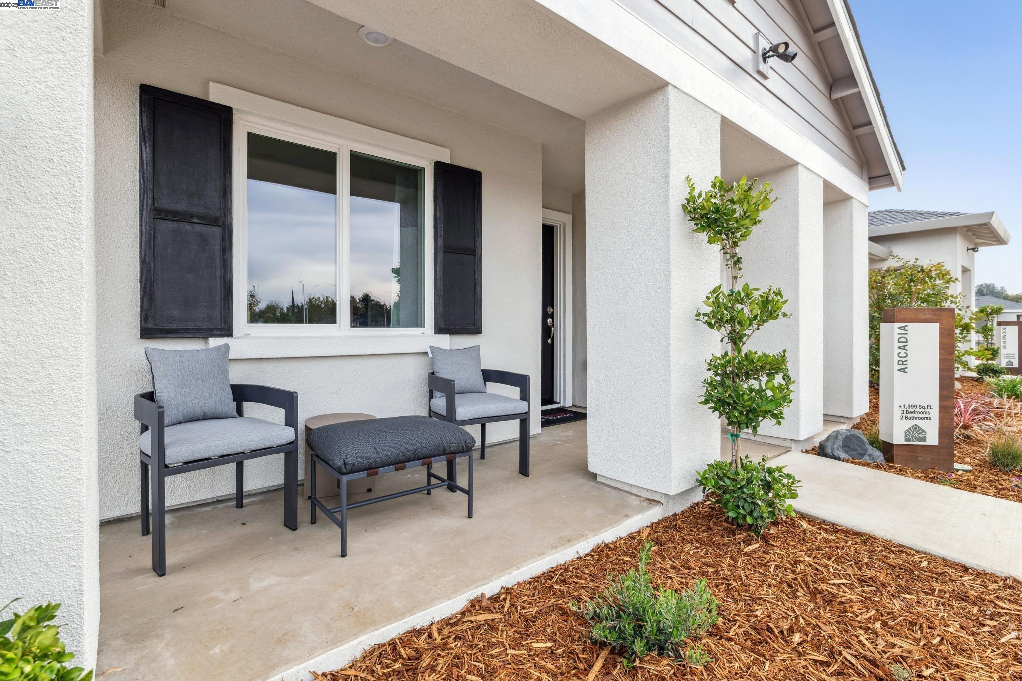 2652 Wesley Way Chico, CA 95973 - Photo 4 of 45 a view of a porch with chairs and potted plants