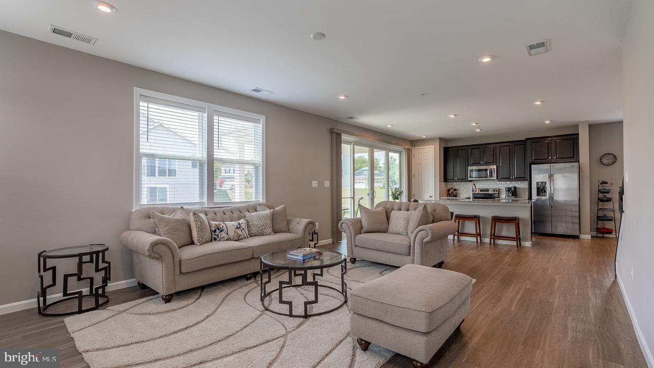 12610 Rosencrans Dr. Hagerstown, MD 21740 - Photo 12 of 49 a living room with furniture and a large window