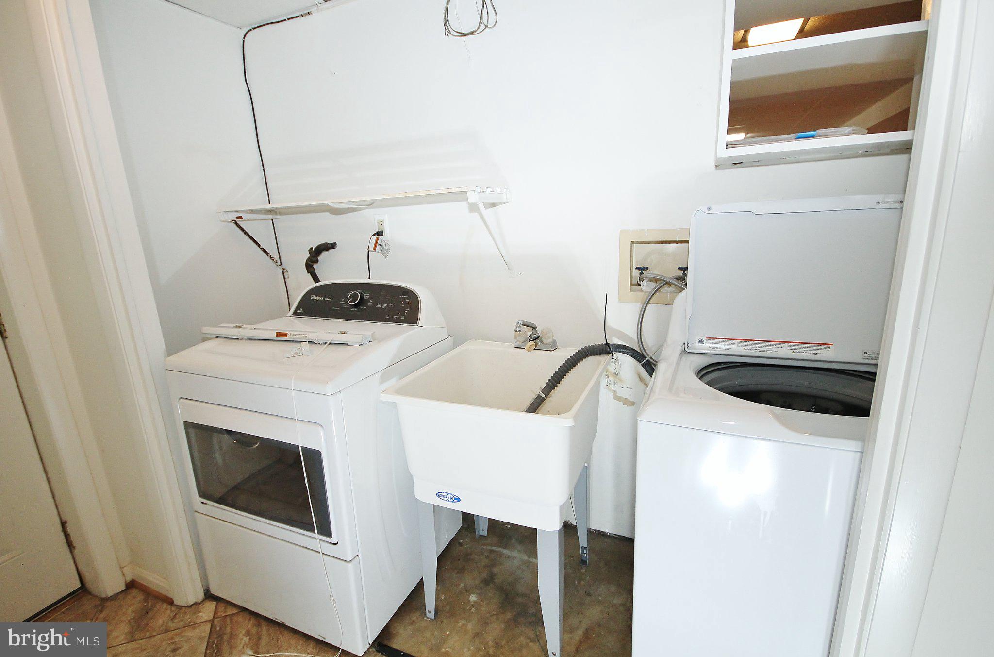 5504 Inverchapel Road Springfield, VA 22151 - Photo 37 of 51 Efficient laundry space with modern appliances.