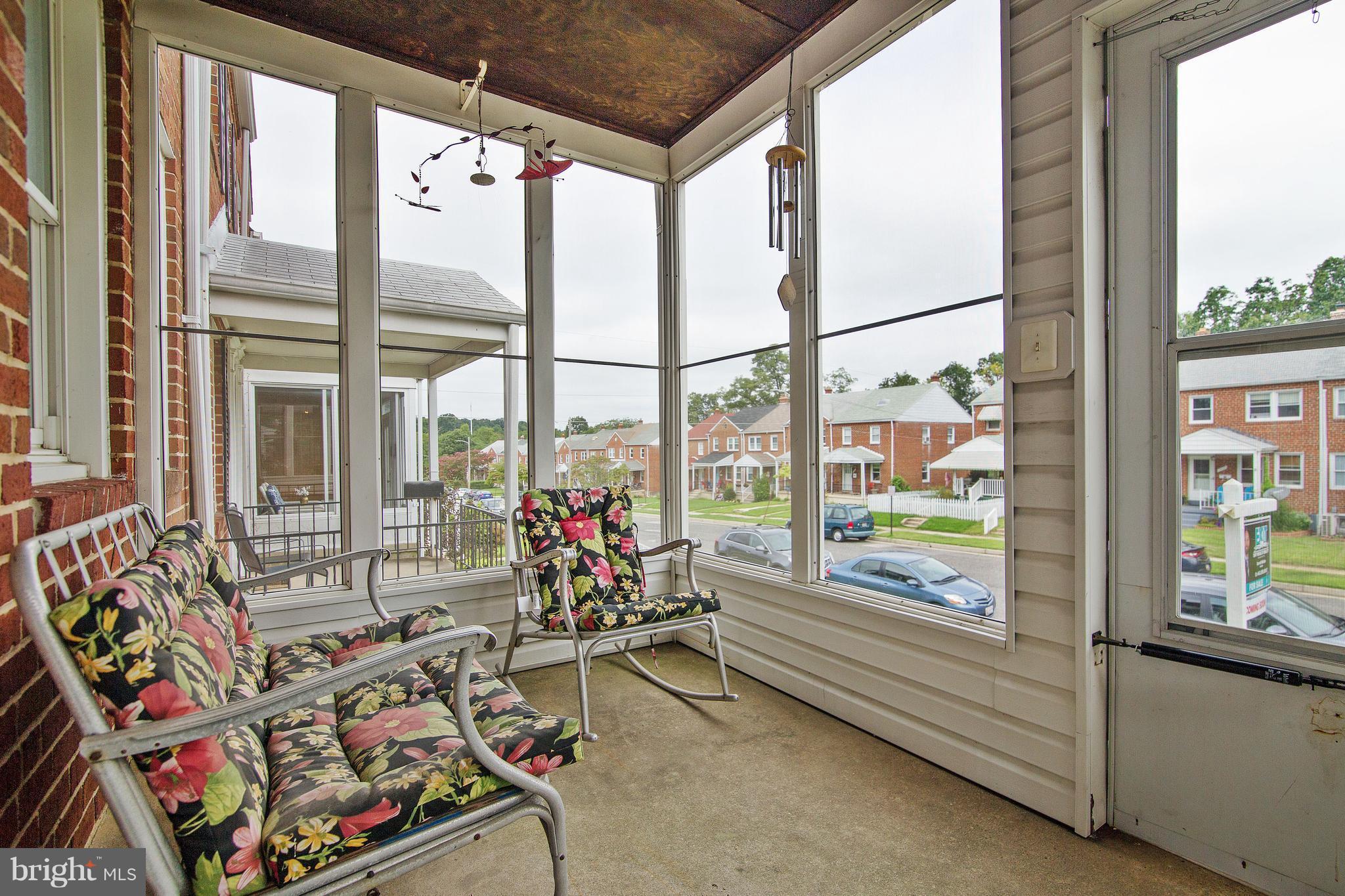 1031 Elm Road Baltimore, MD 21227 - Photo 2 of 25 Charming Enclosed Front Porch