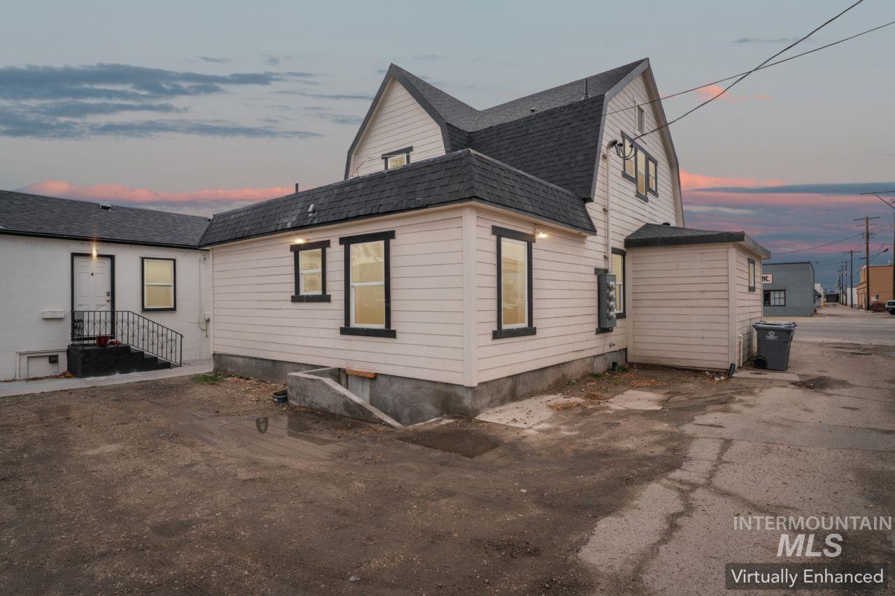 911 2nd Street South Nampa, ID 83651 - Photo 2 of 50 Rear view of house featuring roof with shingles and a gambrel roof