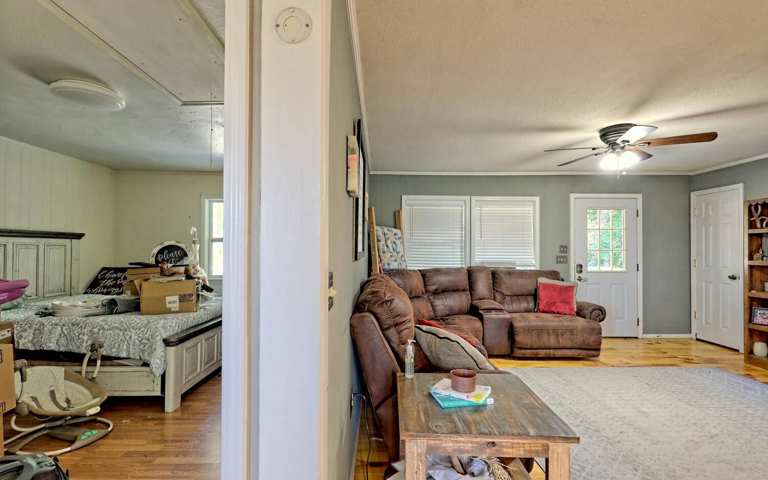 760 Panther Top Road Murphy, NC 28906 - Photo 16 of 45 a living room with furniture and a flat screen tv
