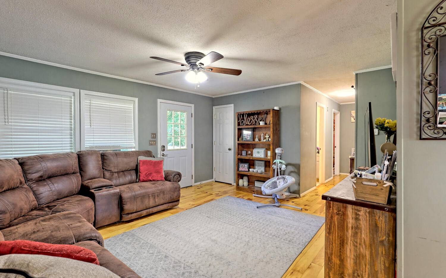 760 Panther Top Road Murphy, NC 28906 - Photo 17 of 45 a living room with furniture ceiling fan and a window
