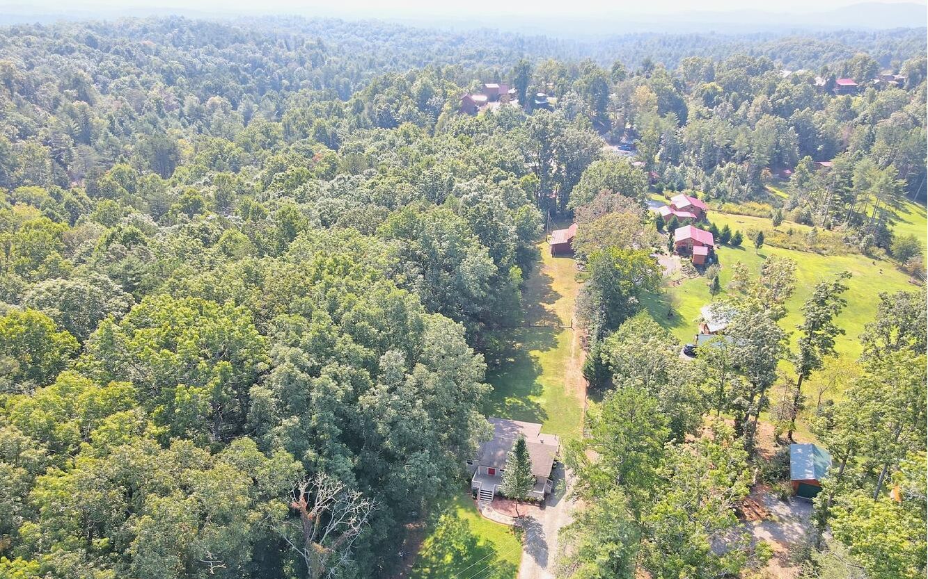 760 Panther Top Road Murphy, NC 28906 - Photo 41 of 45 an aerial view of residential houses with outdoor space and trees