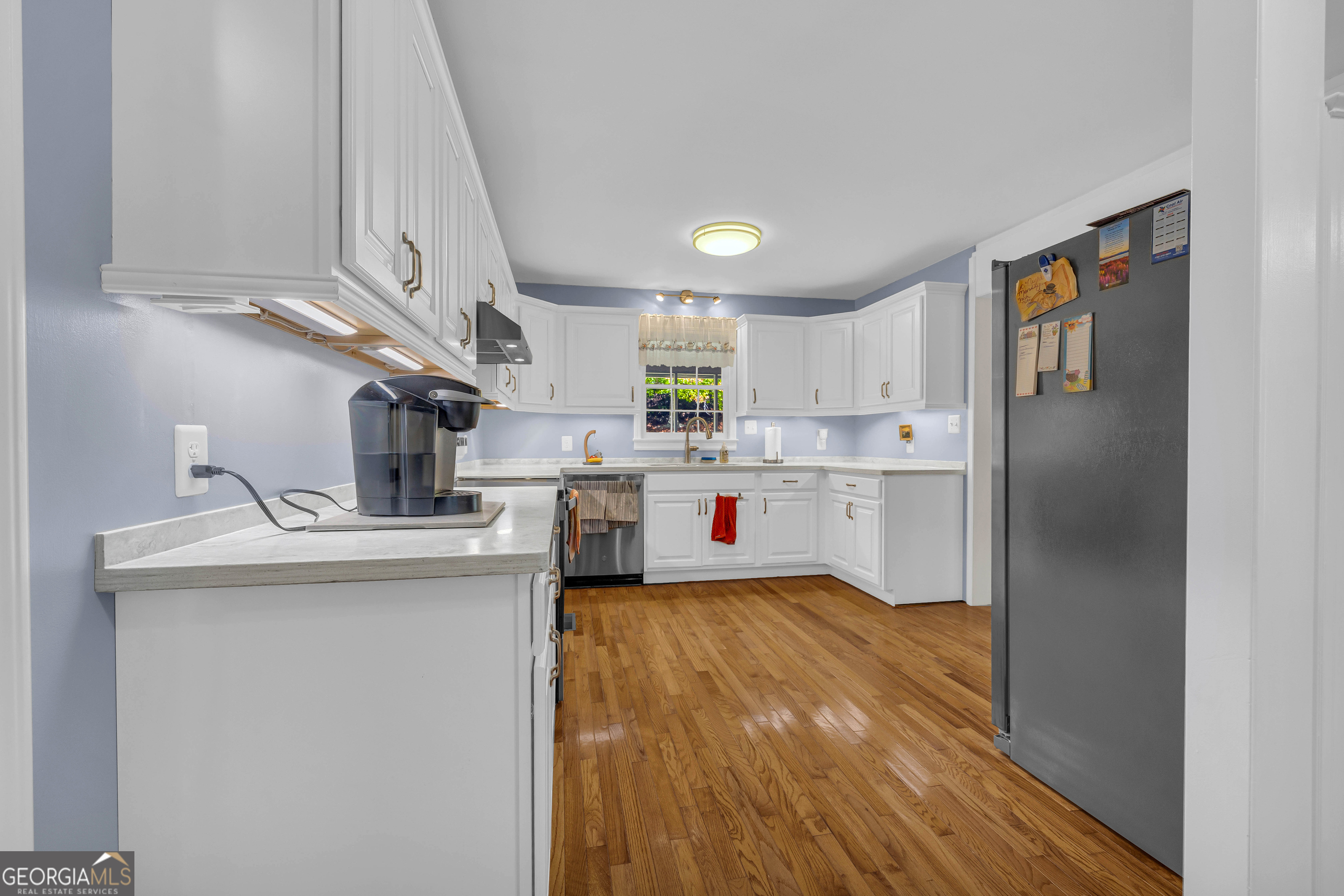 97 Estatohe Circle Toccoa, GA 30577 - Photo 24 of 54 a kitchen with stainless steel appliances a sink stove and refrigerator