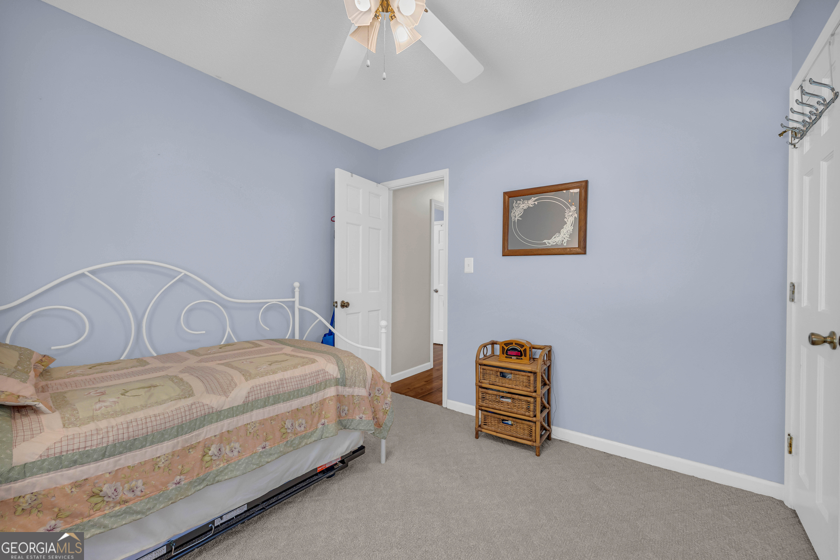 97 Estatohe Circle Toccoa, GA 30577 - Photo 38 of 54 a bedroom with a bed and a lamp on the dresser
