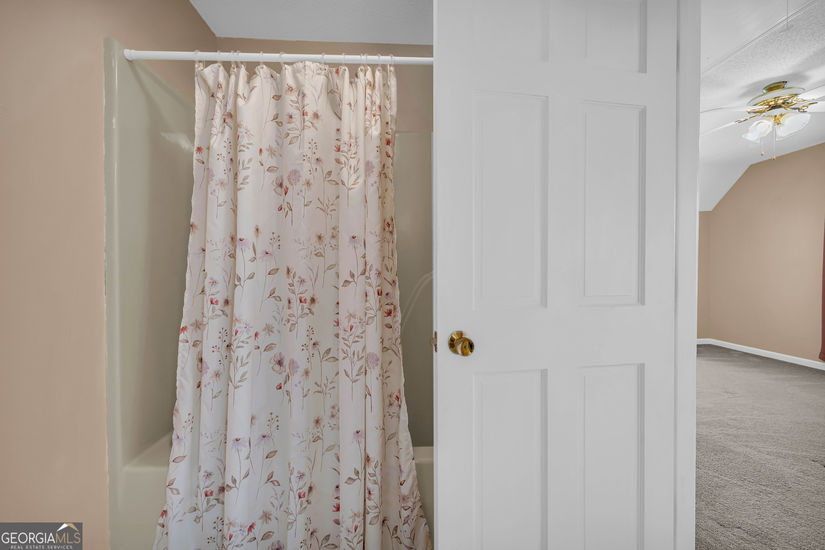 97 Estatohe Circle Toccoa, GA 30577 - Photo 44 of 54 a bathroom with a shower curtain
