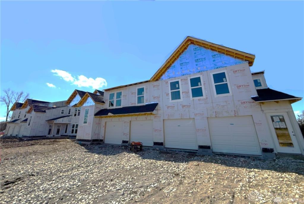 500 Pilot Point, Unit 2204 Vandalia, OH 45377 - Photo 1 of 7 This newly constructed structure features multiple garages, offering ample space and convenience.