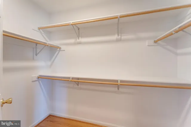 a bathroom with a bathtub a sink and a window