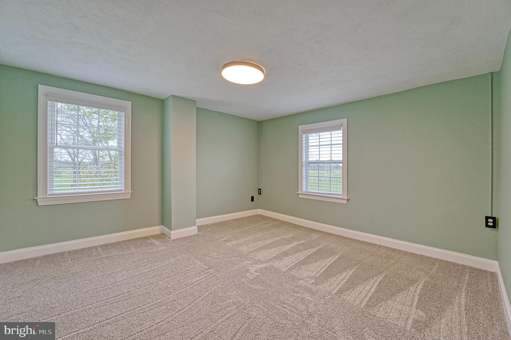 1080 Russell Road Berryville, VA 22611 - Photo 18 of 31 a view of an empty room with a window