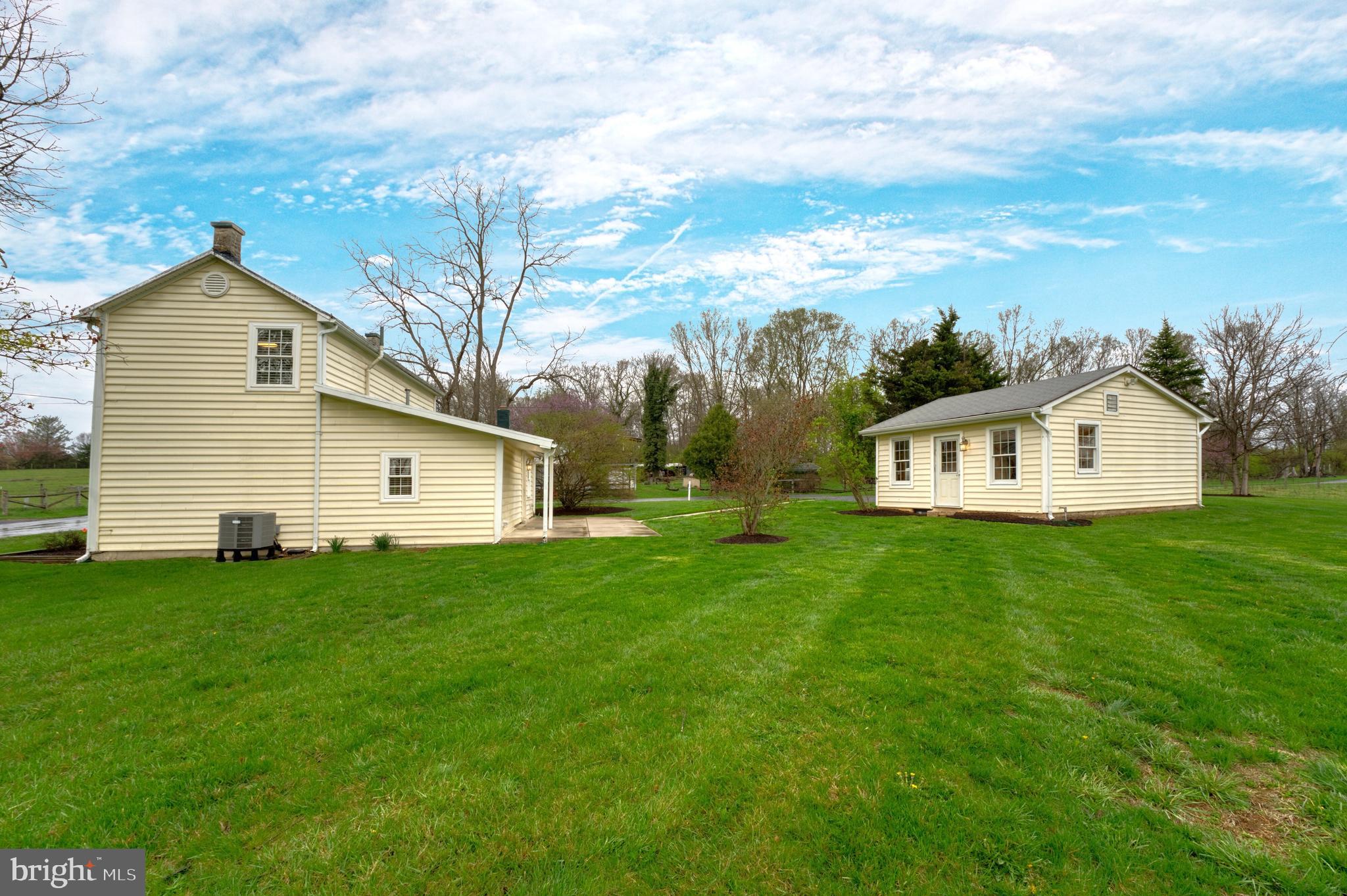 1080 Russell Road Berryville, VA 22611 - Photo 21 of 31 a view of a yard in front of a house with large tree