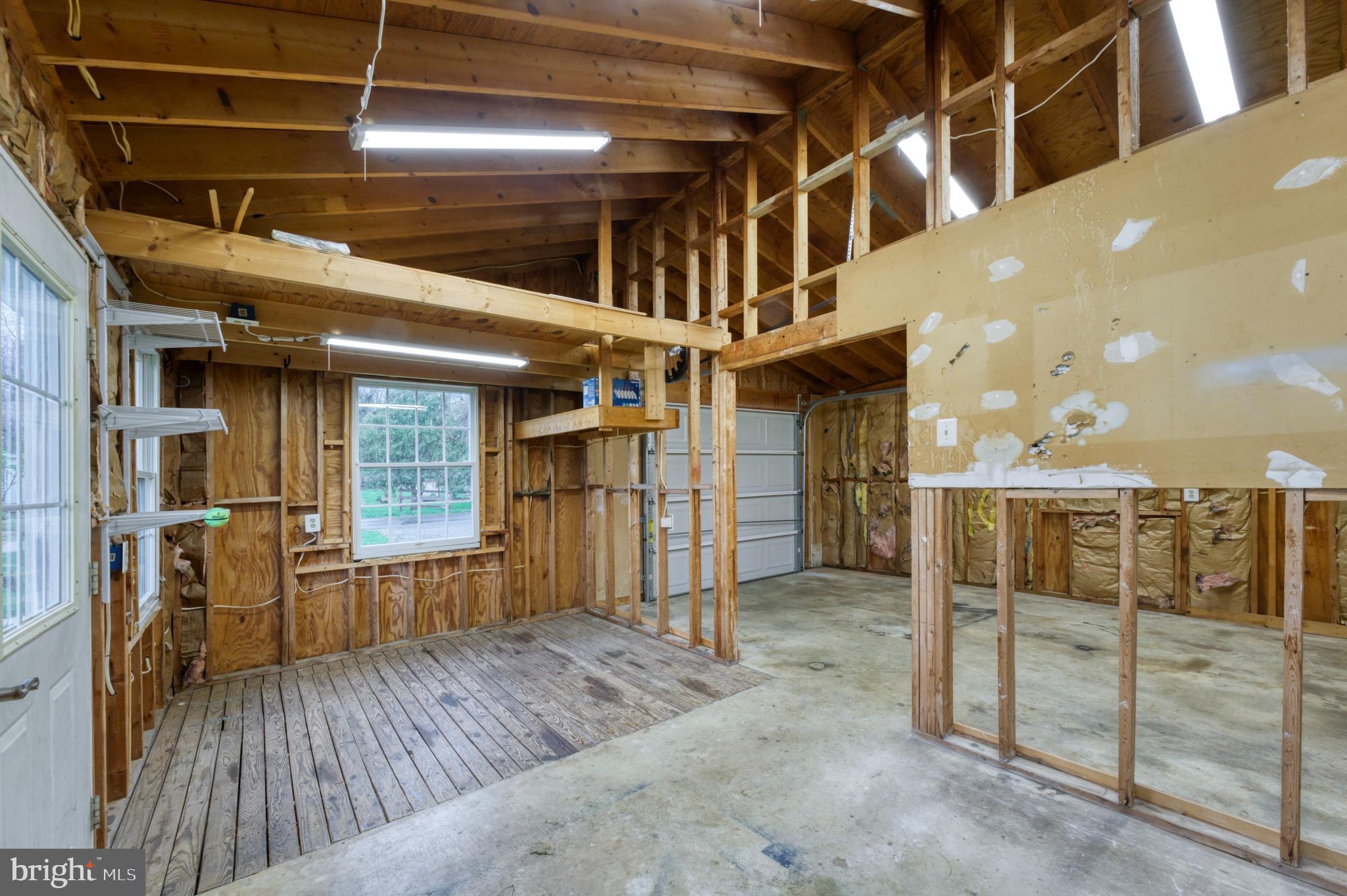 1080 Russell Road Berryville, VA 22611 - Photo 23 of 31 a view of an empty room with wooden floor
