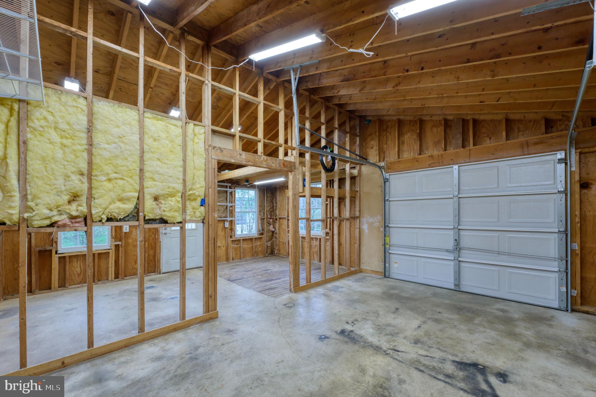1080 Russell Road Berryville, VA 22611 - Photo 24 of 31 a view of an empty room with a glass door
