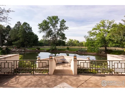 a kitchen with kitchen island a counter top a stove and a refrigerator