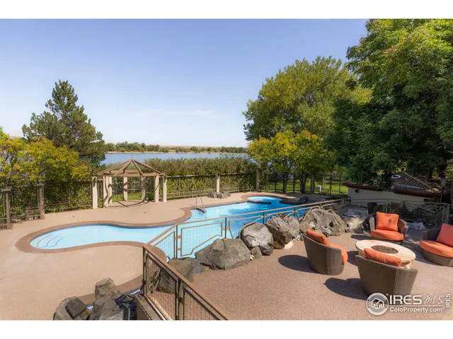 a view of a balcony with chairs