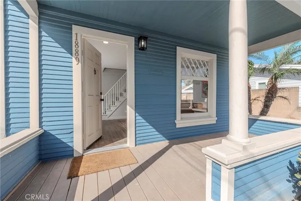 a front view of a house with a porch