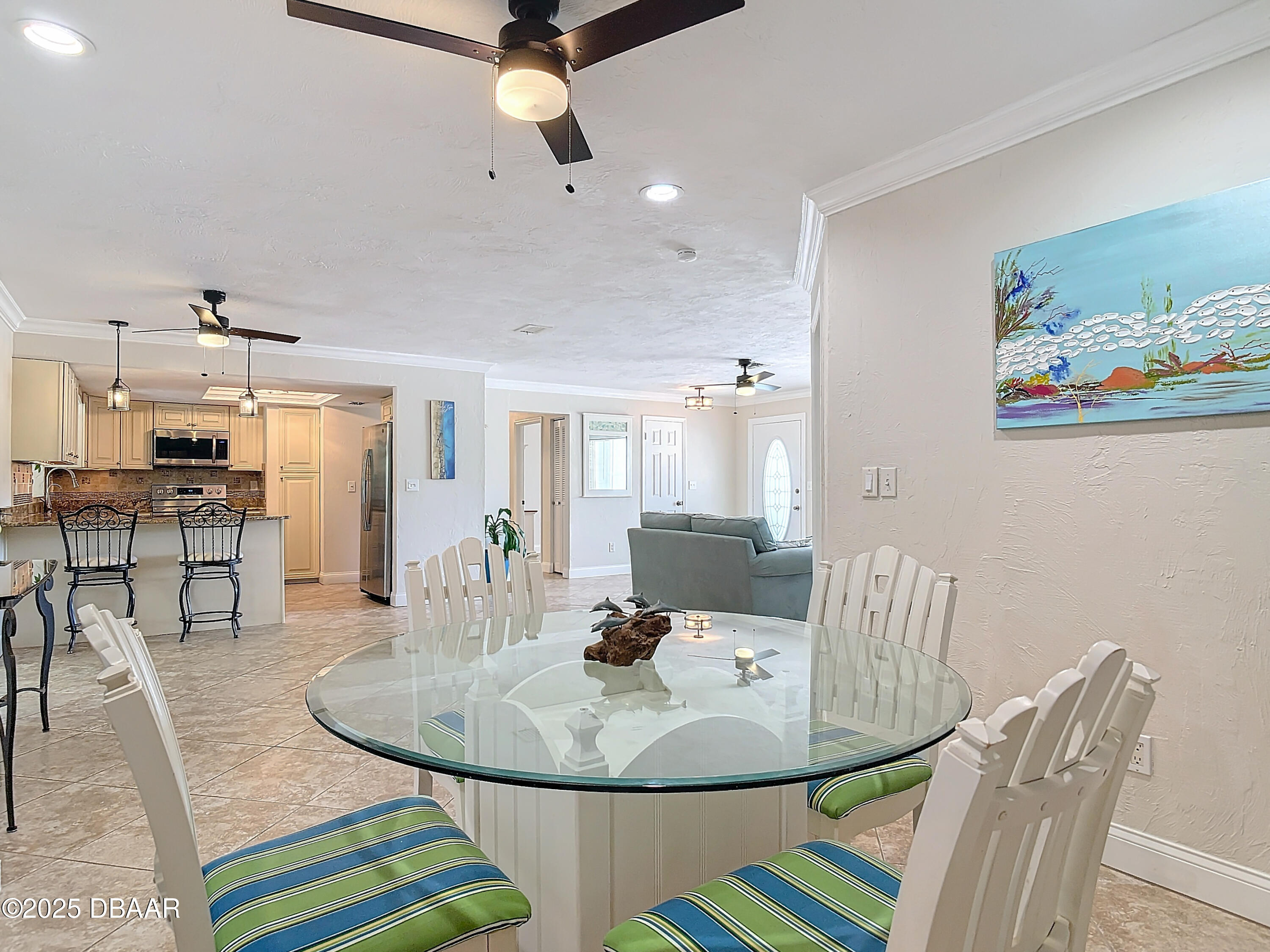 86 Rains Court Ponce Inlet, FL 32127 - Photo 15 of 71 a dining room with furniture and wooden floor