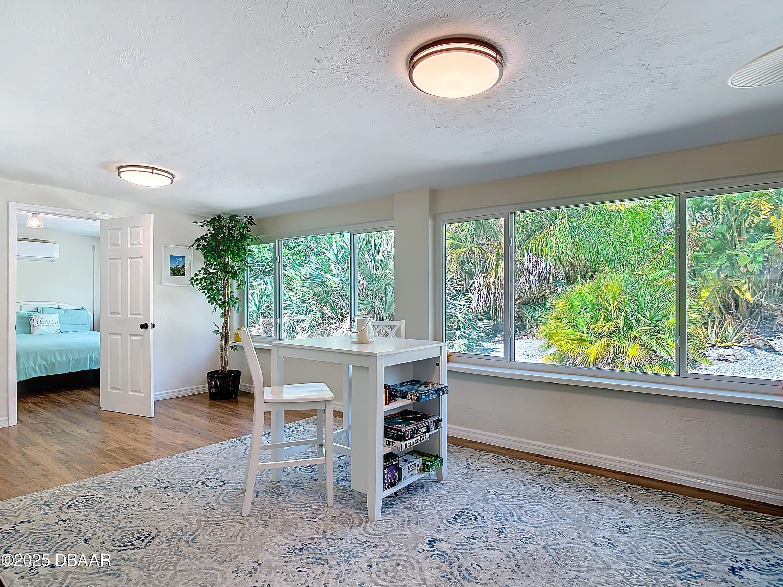 86 Rains Court Ponce Inlet, FL 32127 - Photo 25 of 71 a living room with furniture and a large window