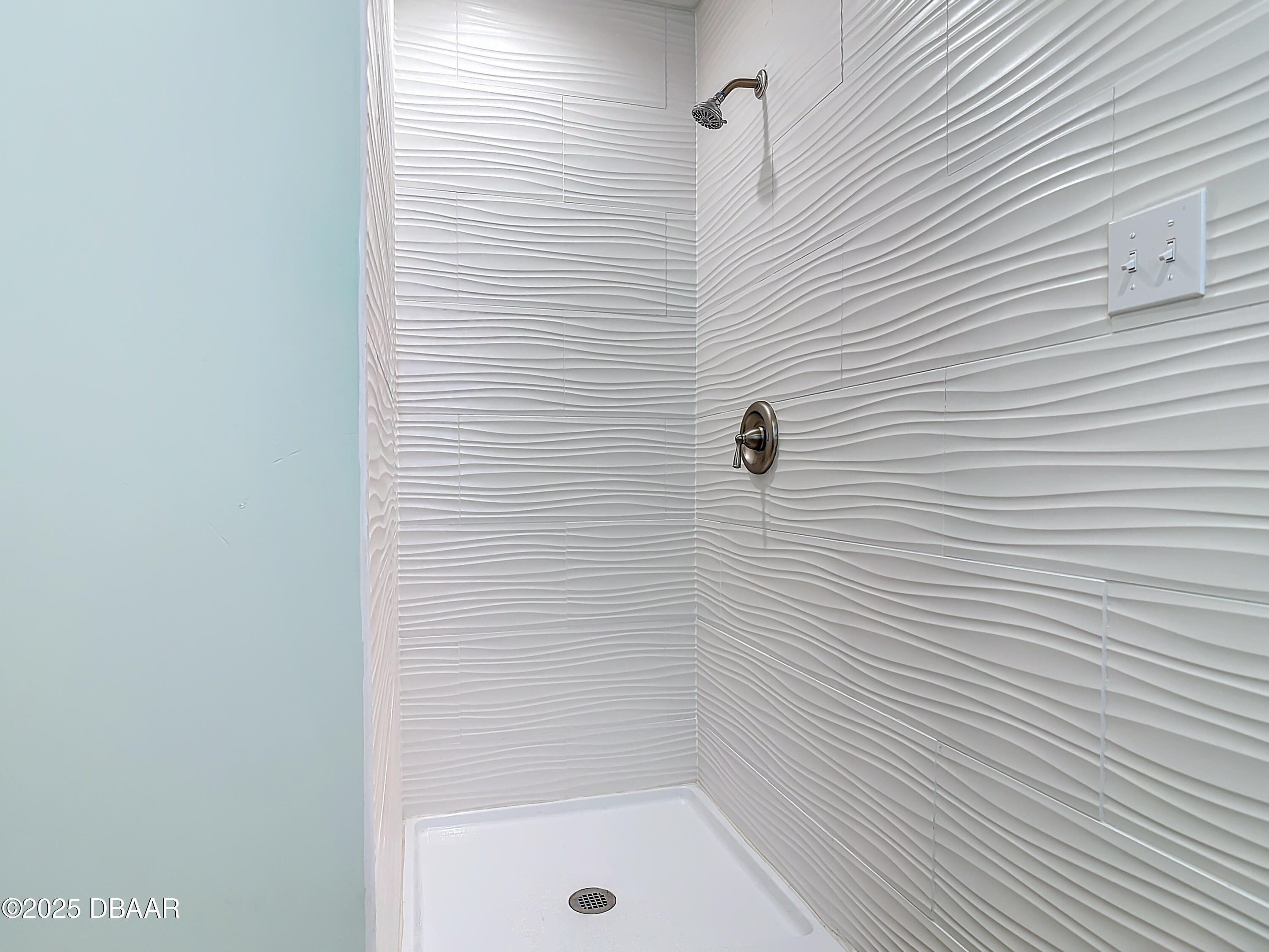 86 Rains Court Ponce Inlet, FL 32127 - Photo 33 of 71 a bathroom with a shower