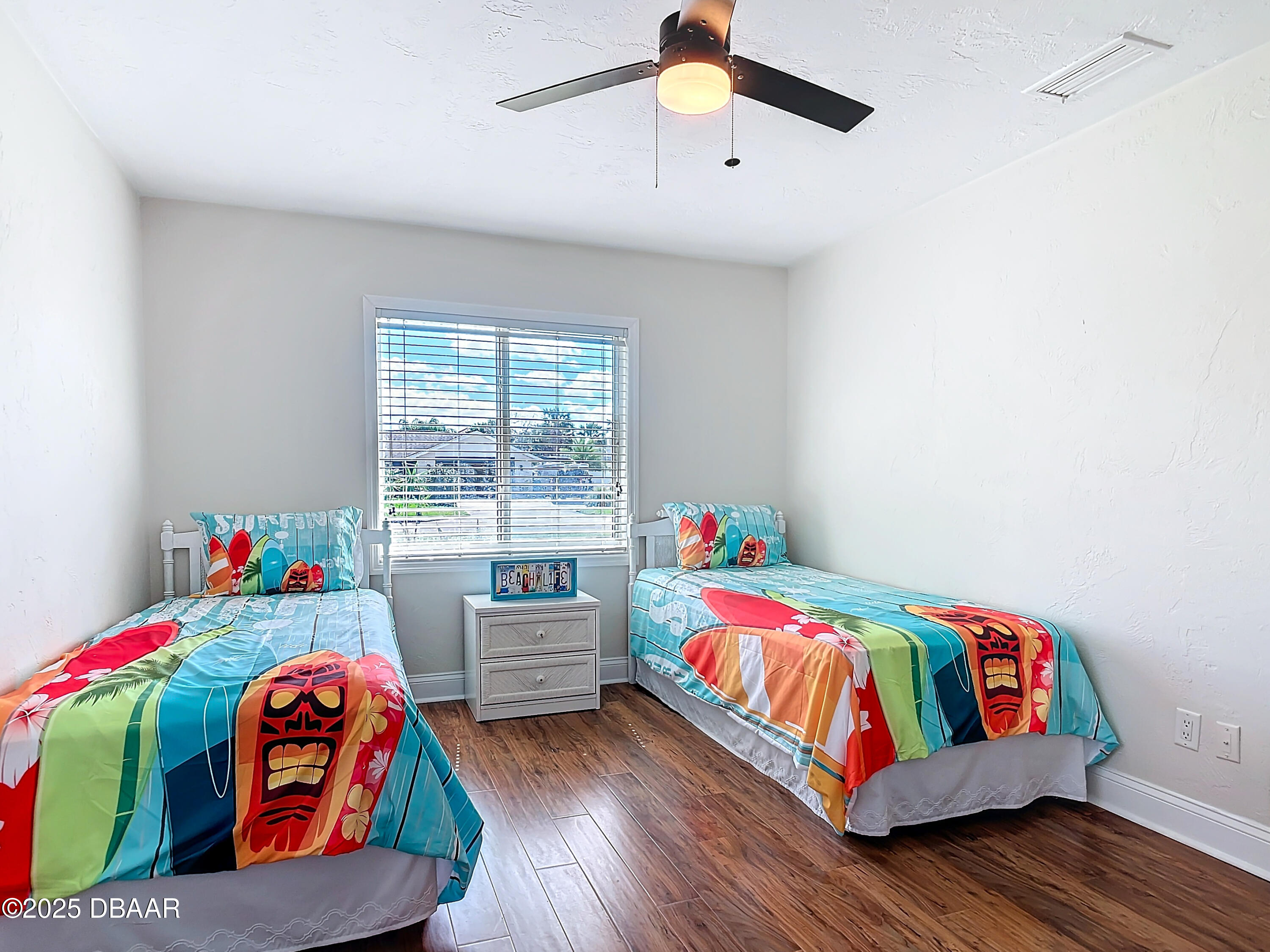 86 Rains Court Ponce Inlet, FL 32127 - Photo 40 of 71 a bedroom with bed and window
