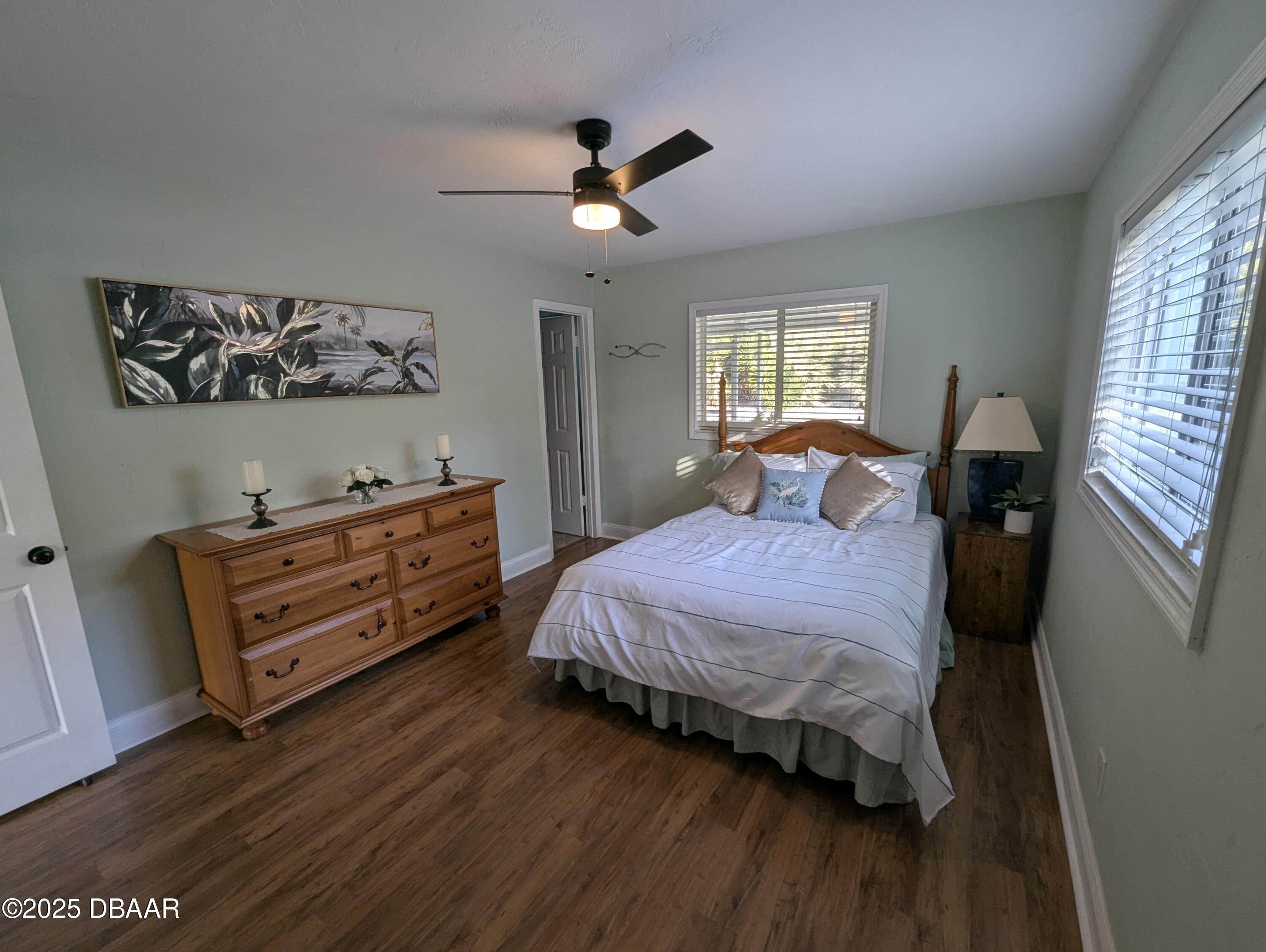 86 Rains Court Ponce Inlet, FL 32127 - Photo 44 of 71 a bedroom with a bed and a dresser