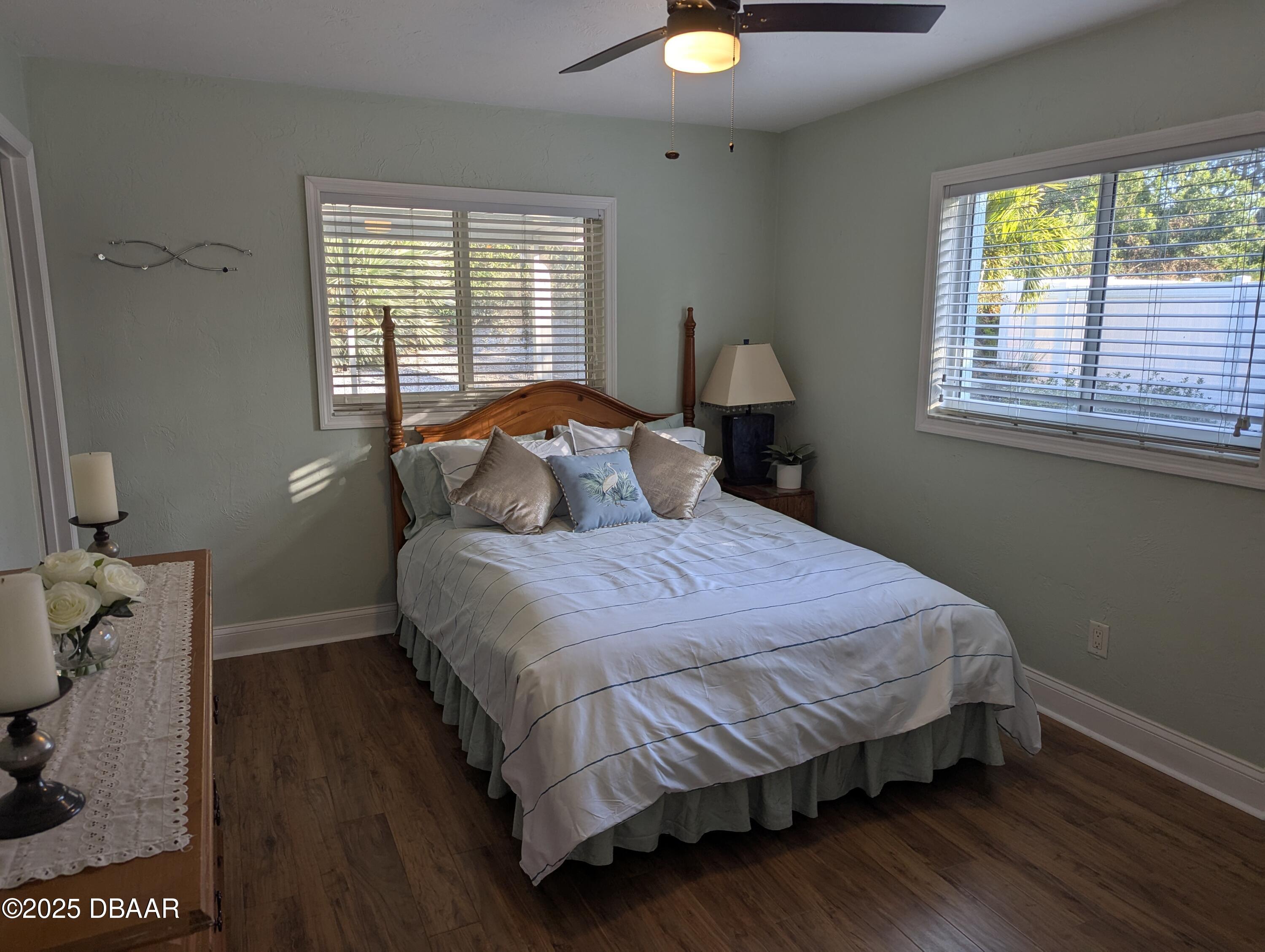 86 Rains Court Ponce Inlet, FL 32127 - Photo 46 of 71 a bedroom with a bed and window