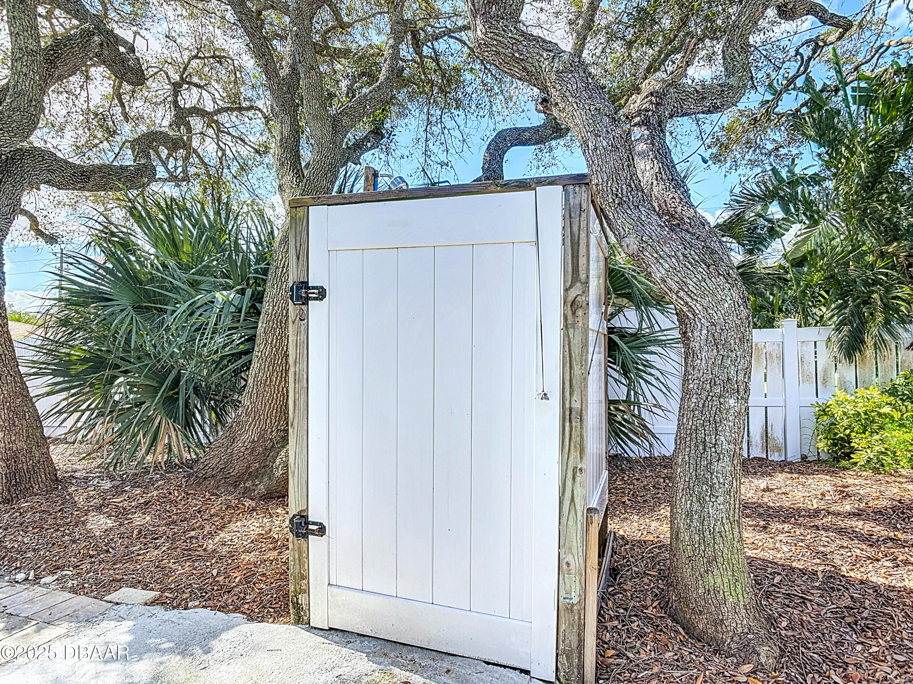 86 Rains Court Ponce Inlet, FL 32127 - Photo 58 of 71 a view of a house with a tree