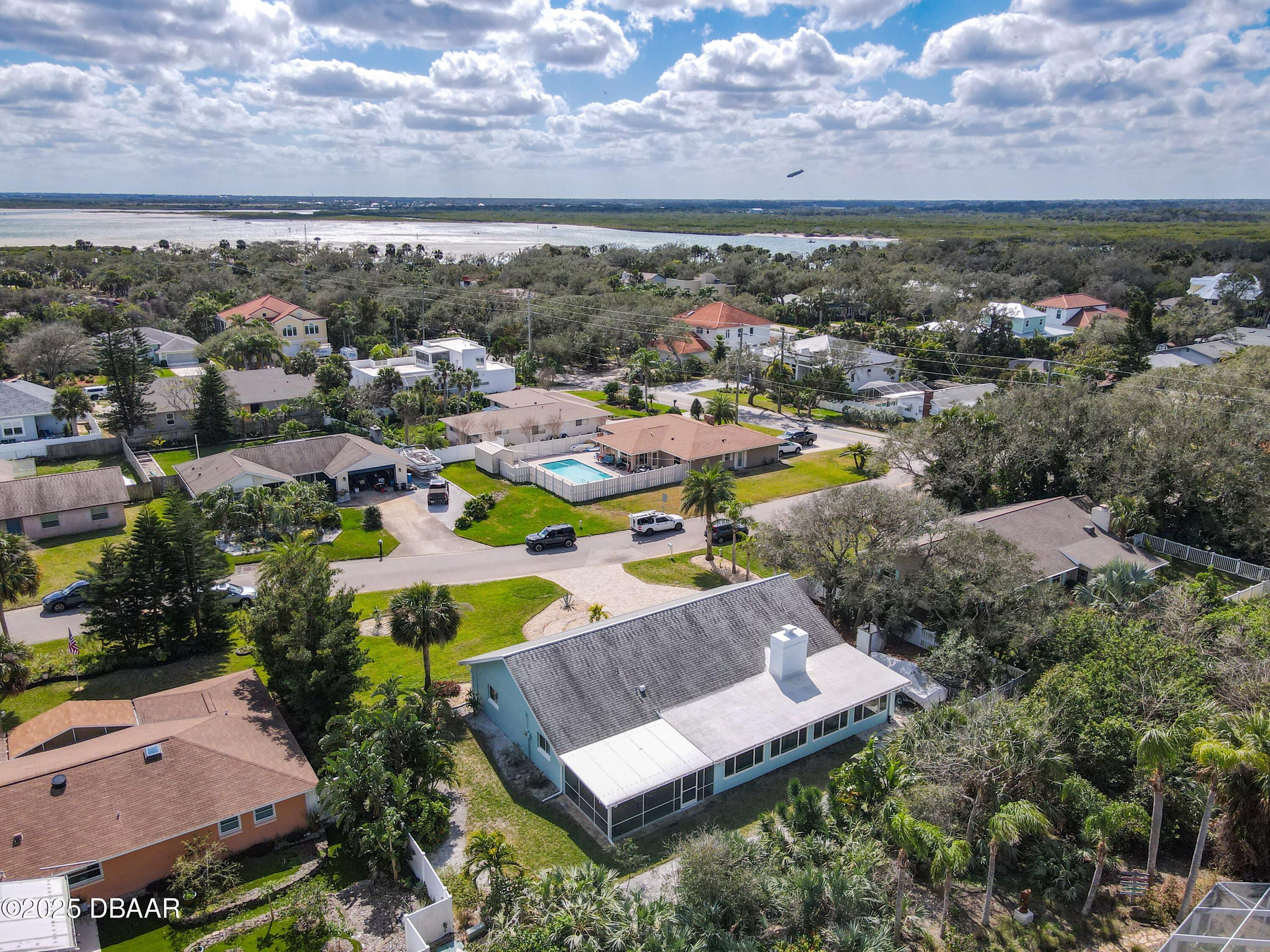 86 Rains Court Ponce Inlet, FL 32127 - Photo 60 of 71 a view of a city with mountains