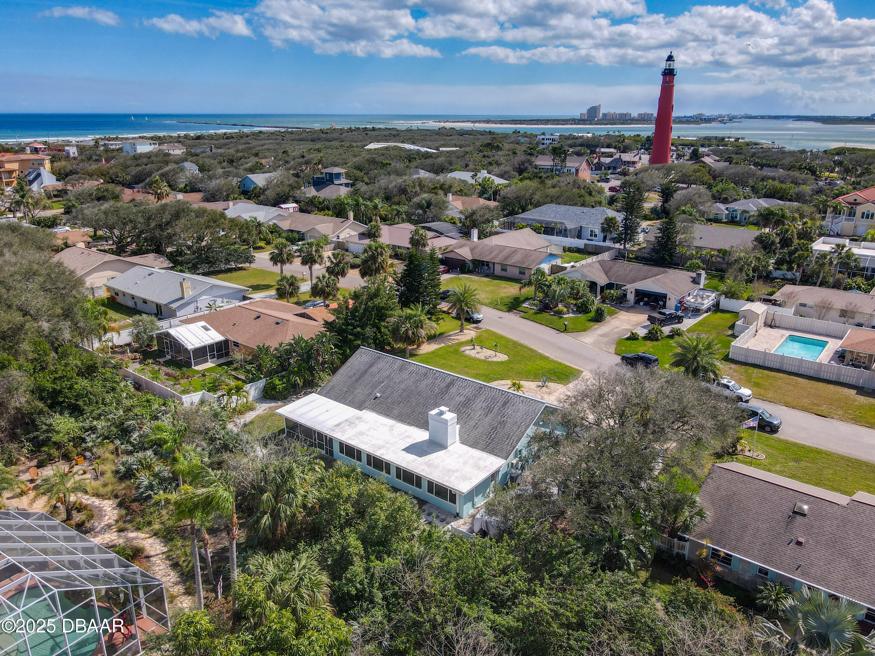 86 Rains Court Ponce Inlet, FL 32127 - Photo 61 of 71 an aerial view of a house with a garden