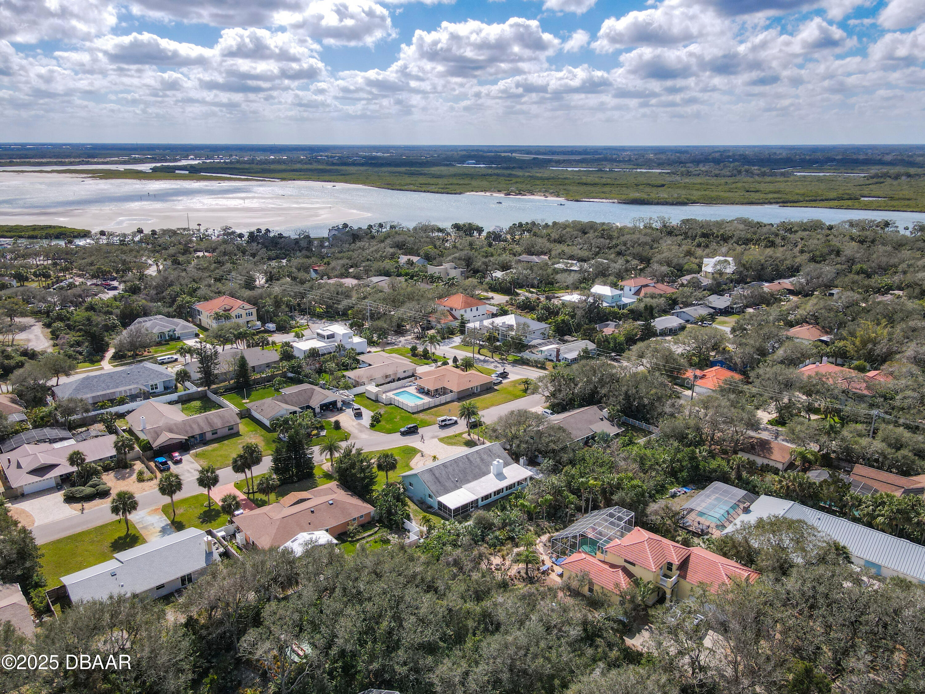 86 Rains Court Ponce Inlet, FL 32127 - Photo 63 of 71 a view of a city with mountains in the background