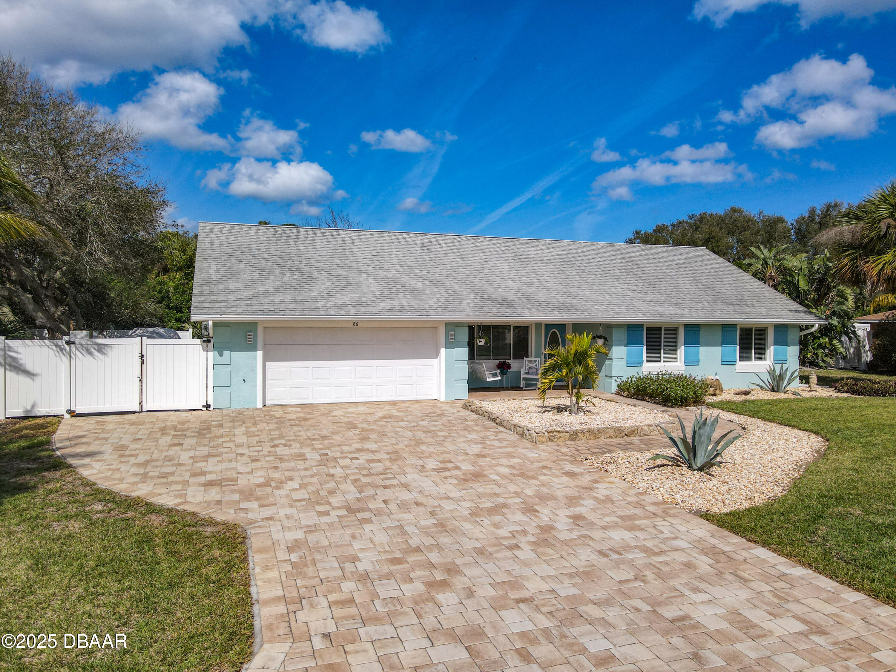 86 Rains Court Ponce Inlet, FL 32127 - Photo 64 of 71 a view of a house with backyard patio and fire pit